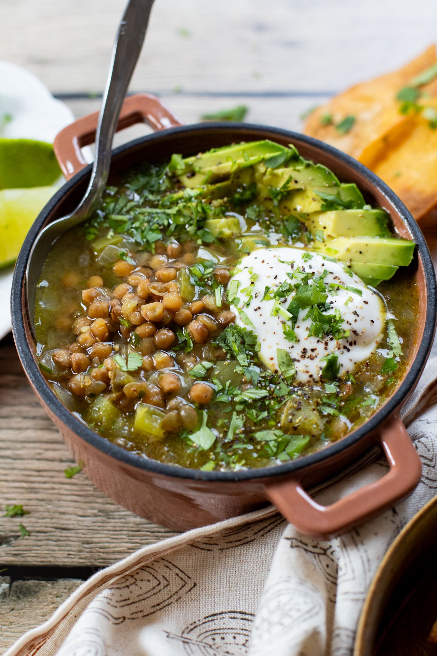 Simple, quick and delicious, this Salsa Verde Lentil Soup is the perfect fall dinner. Ready in 30 minutes and packed with flavor | ThisSavoryVegan.com