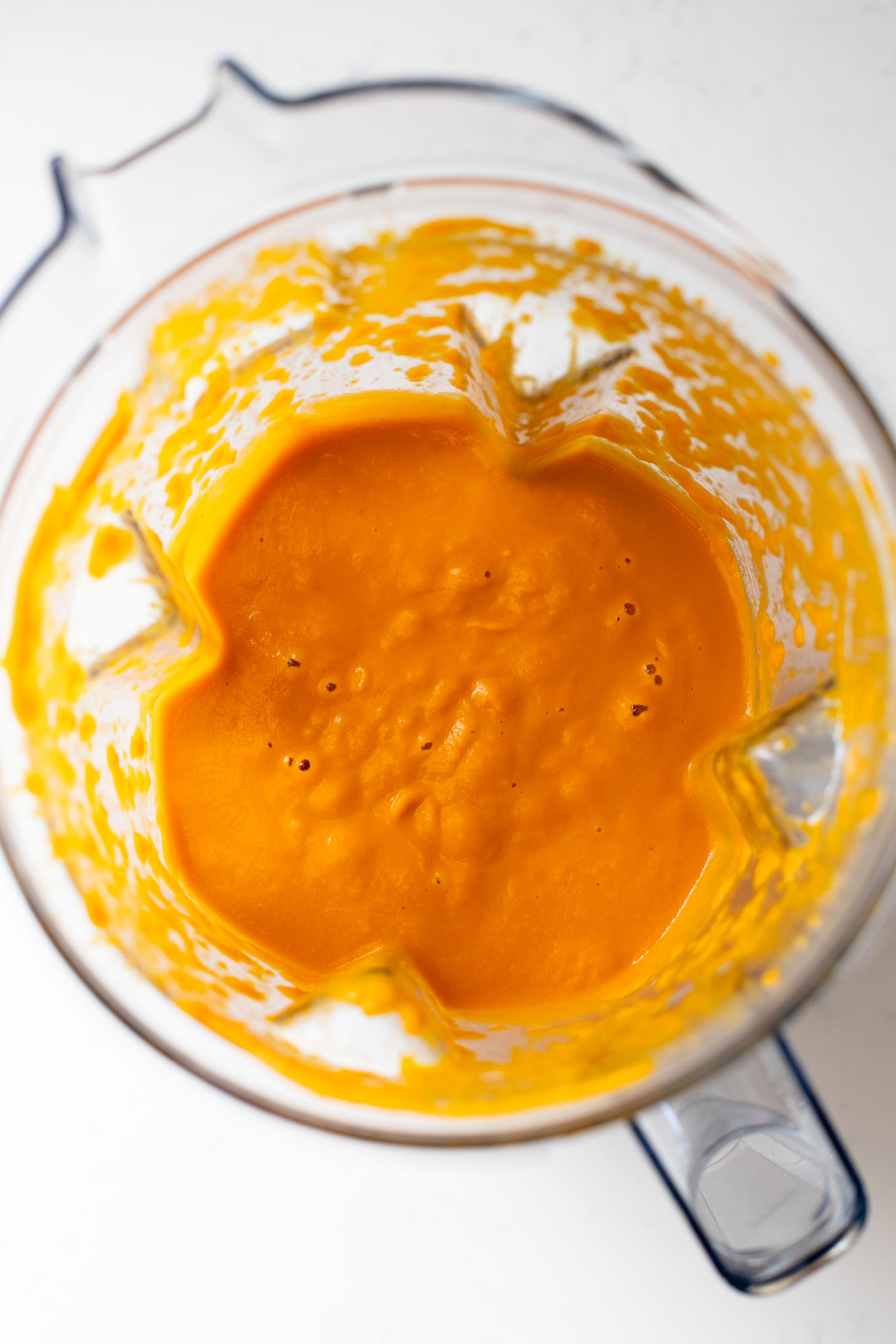 Creamy and comforting, this Thai Curry Pumpkin Soup is a dairy-free fall soup that everyone will love. Topped with crispy chickpeas | ThisSavoryVegan.com