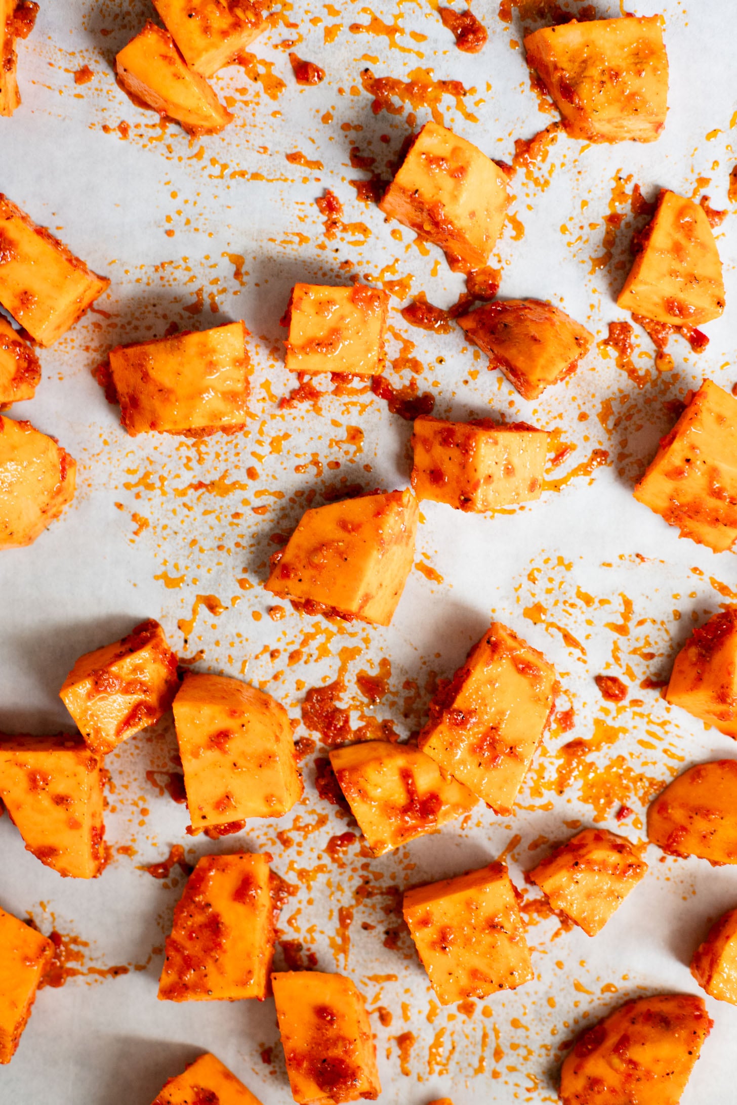 This Harissa Sweet Potato Kale Salad is layered with kale, lentils, vegan honey mustard dressing and crispy roasted sweet potatoes | ThisSavoryVegan.com