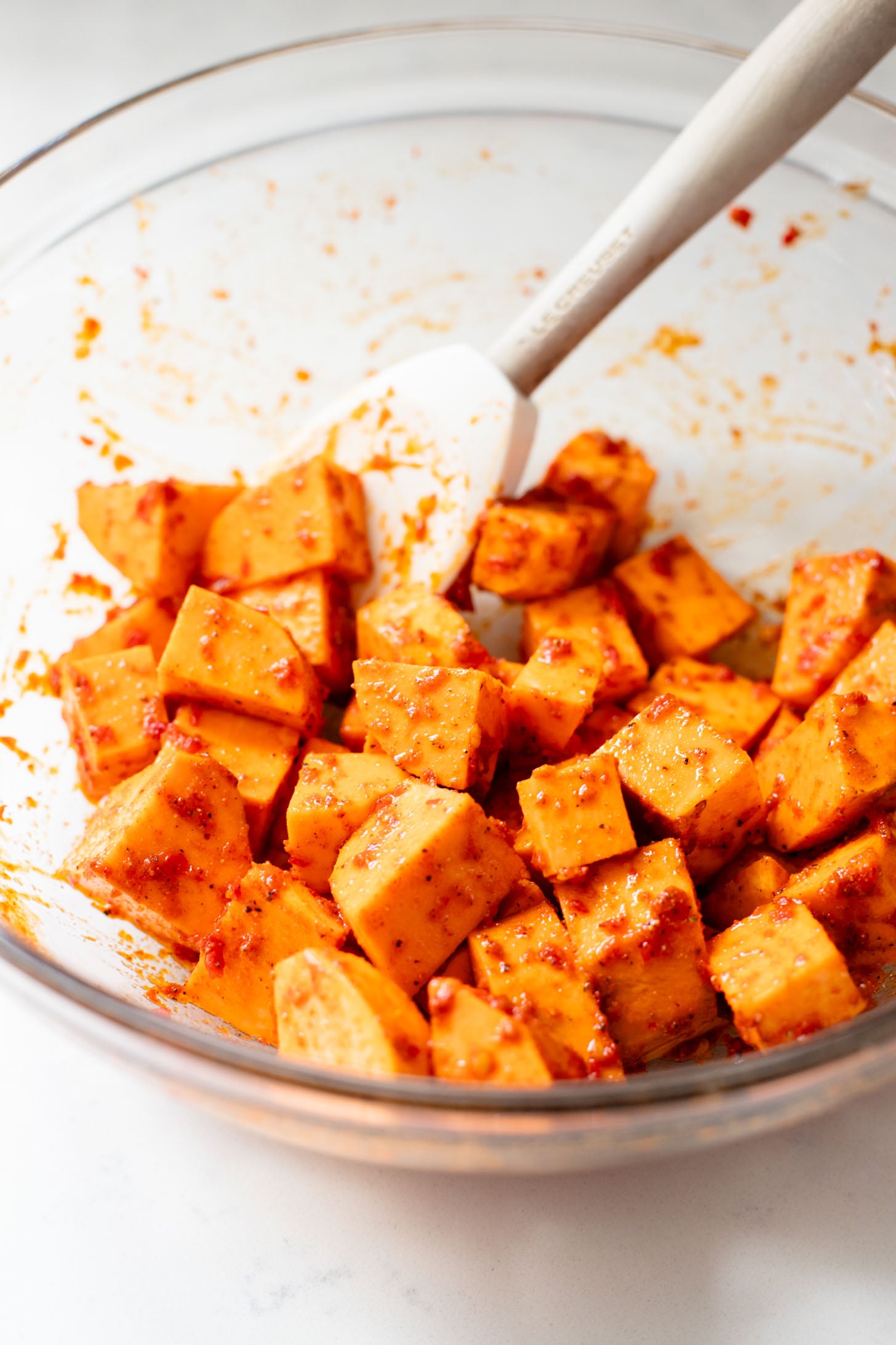 This Harissa Sweet Potato Kale Salad is layered with kale, lentils, vegan honey mustard dressing and crispy roasted sweet potatoes | ThisSavoryVegan.com