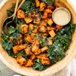 This Harissa Sweet Potato Kale Salad is layered with kale, lentils, vegan honey mustard dressing and crispy roasted sweet potatoes | ThisSavoryVegan.com