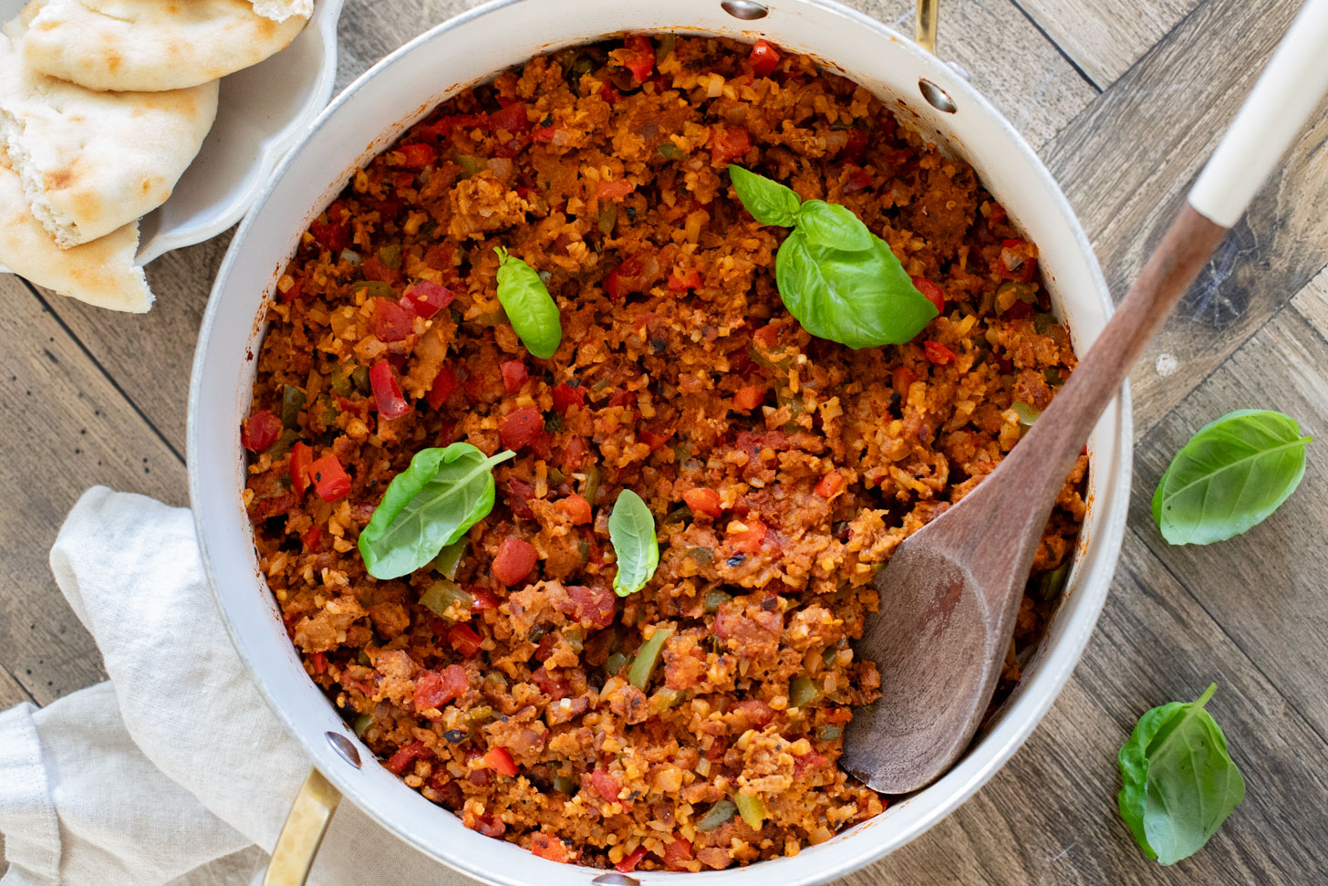This Vegan Sausage Cauliflower Rice Skillet is the perfect high-protein vegan dinner! Everything is made in one pan for easy clean up | ThisSavoryVegan.com