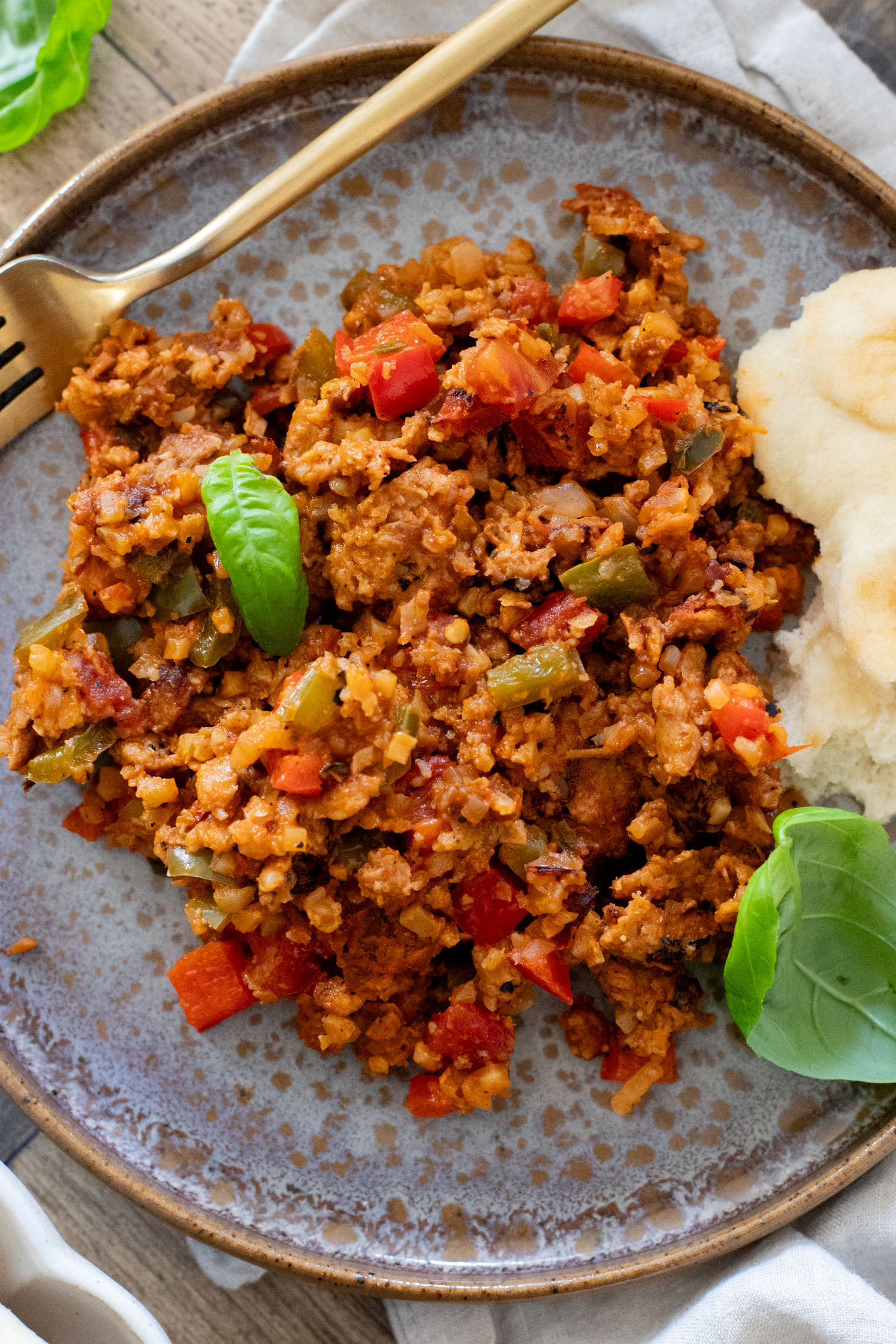 This Vegan Sausage Cauliflower Rice Skillet is the perfect high-protein vegan dinner! Everything is made in one pan for easy clean up | ThisSavoryVegan.com