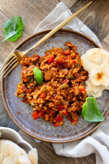 This Vegan Sausage Cauliflower Rice Skillet is the perfect high-protein vegan dinner! Everything is made in one pan for easy clean up | ThisSavoryVegan.com