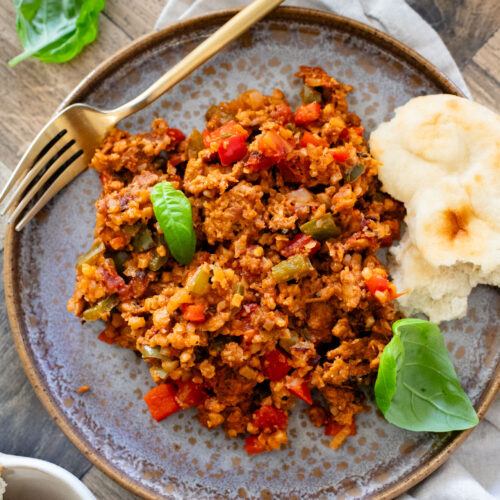 This Vegan Sausage Cauliflower Rice Skillet is the perfect high-protein vegan dinner! Everything is made in one pan for easy clean up | ThisSavoryVegan.com