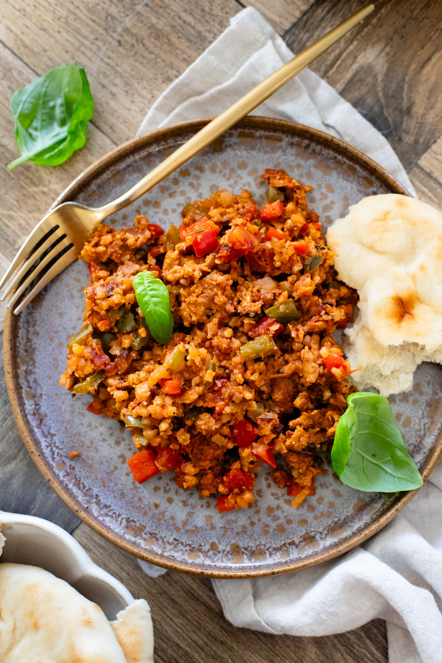 This Vegan Sausage Cauliflower Rice Skillet is the perfect high-protein vegan dinner! Everything is made in one pan for easy clean up | ThisSavoryVegan.com
