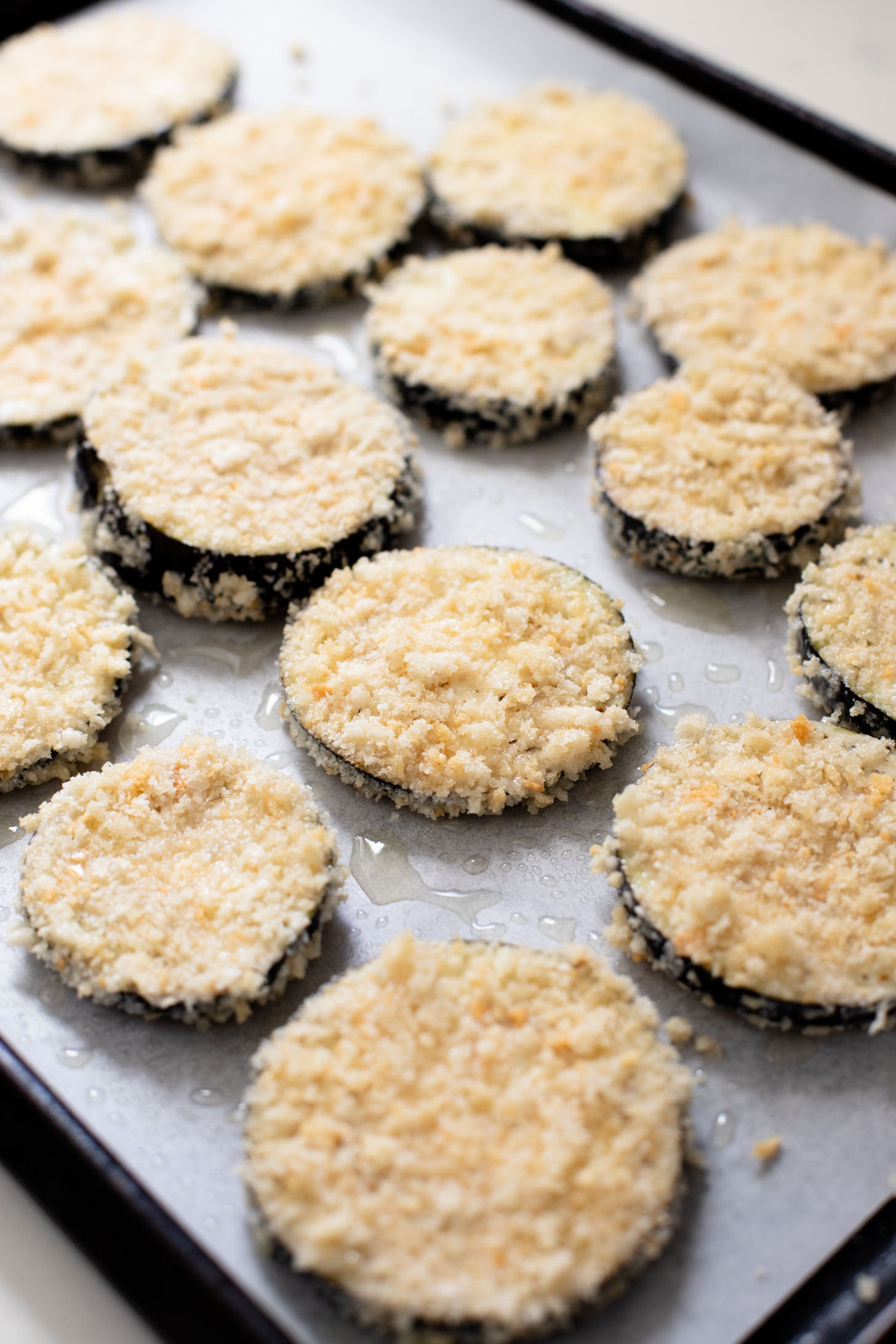 This Baked Eggplant Parmesan is dairy-free and has some sneaky protein in there. Serve with a salad for a low carb dinner or with a bowl of pasta | ThisSavoryVegan.com