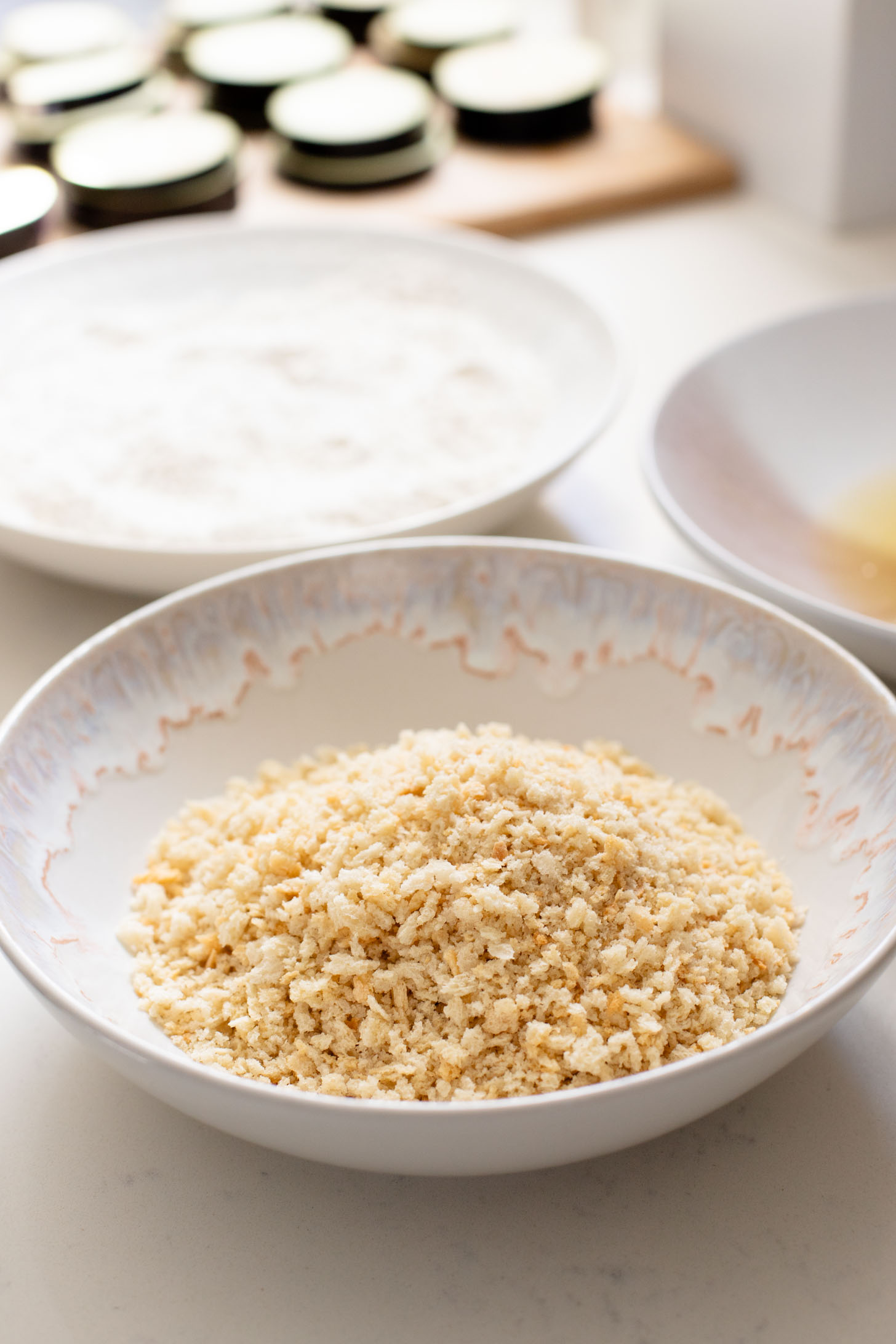 This Baked Eggplant Parmesan is dairy-free and has some sneaky protein in there. Serve with a salad for a low carb dinner or with a bowl of pasta | ThisSavoryVegan.com