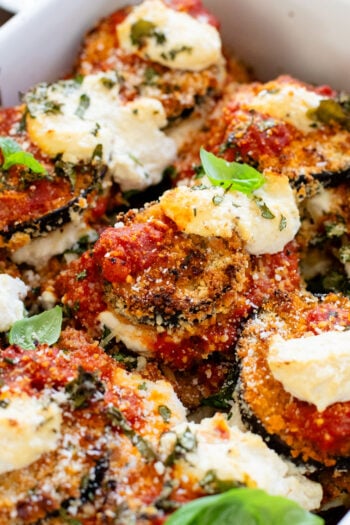 This Baked Eggplant Parmesan is dairy-free and has some sneaky protein in there. Serve with a salad for a low carb dinner or with a bowl of pasta | ThisSavoryVegan.com