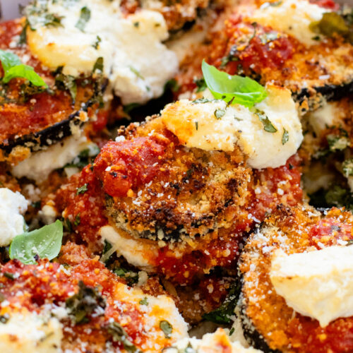 This Baked Eggplant Parmesan is dairy-free and has some sneaky protein in there. Serve with a salad for a low carb dinner or with a bowl of pasta | ThisSavoryVegan.com