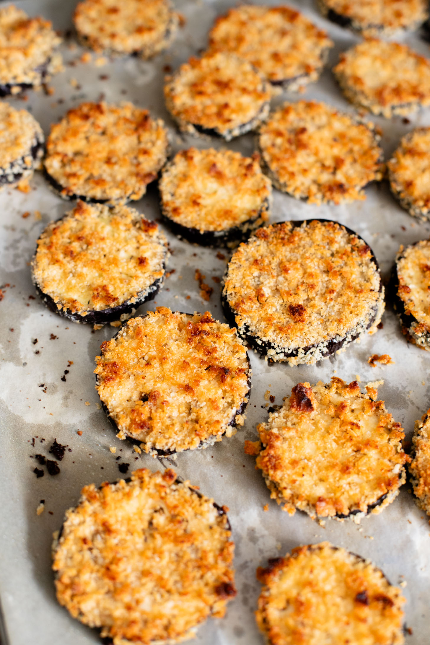 This Baked Eggplant Parmesan is dairy-free and has some sneaky protein in there. Serve with a salad for a low carb dinner or with a bowl of pasta | ThisSavoryVegan.com