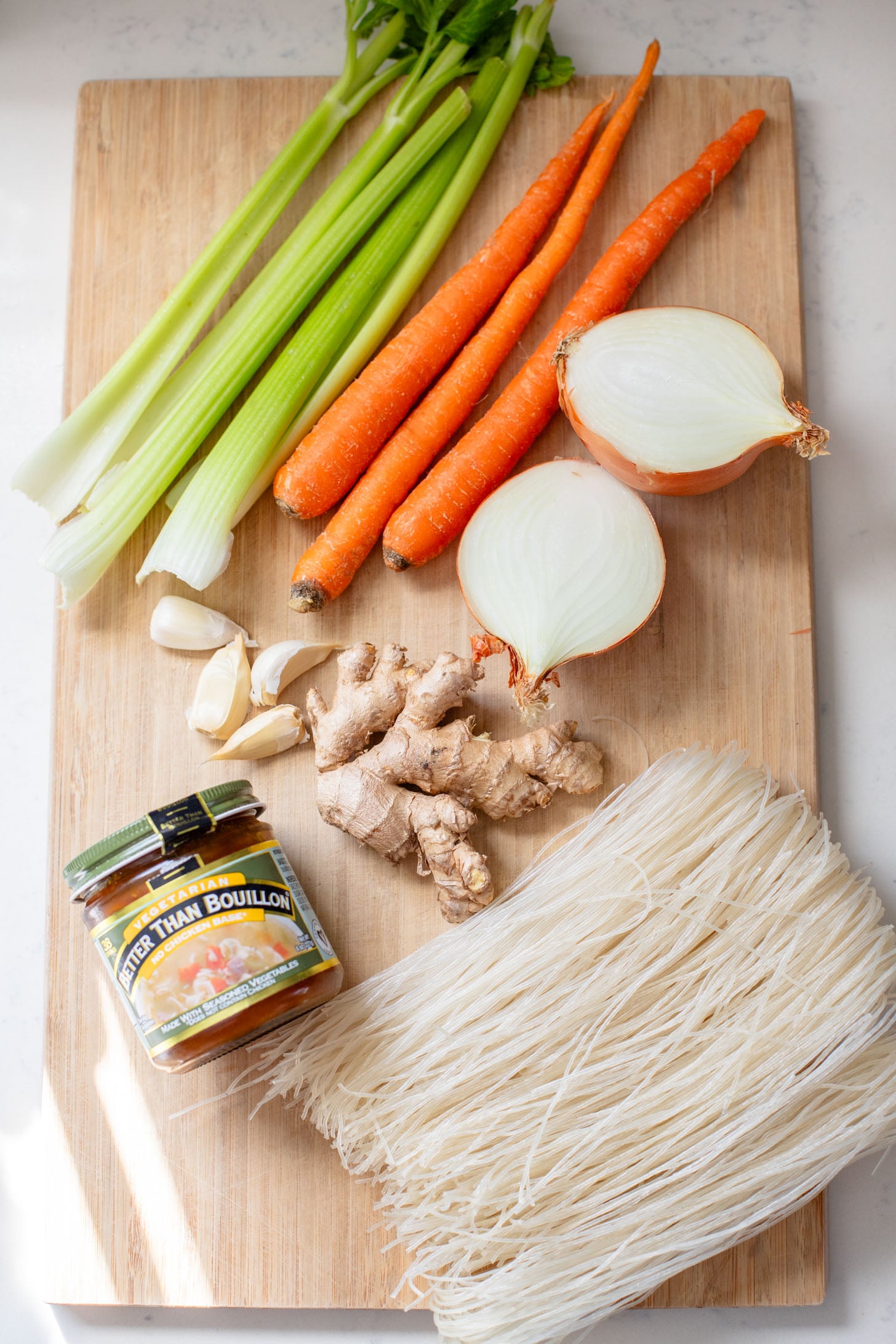 Perfect for a cold day, this Brothy Ginger Noodle Soup is simple and flavorful. A veggie broth base, with tender veggies and rice noodles | ThisSavoryVegan.com