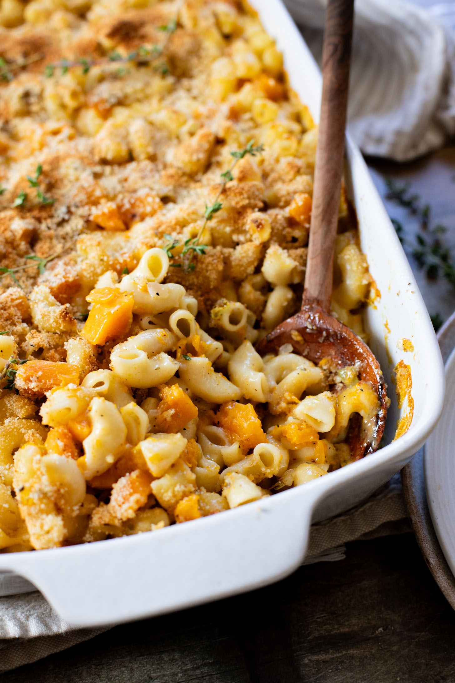 This Cheesy Butternut Squash Pasta Bake is the perfect vegan holiday casserole! Made with a dairy-free cheese sauce & tender squash pieces | ThisSavoryVegan.com