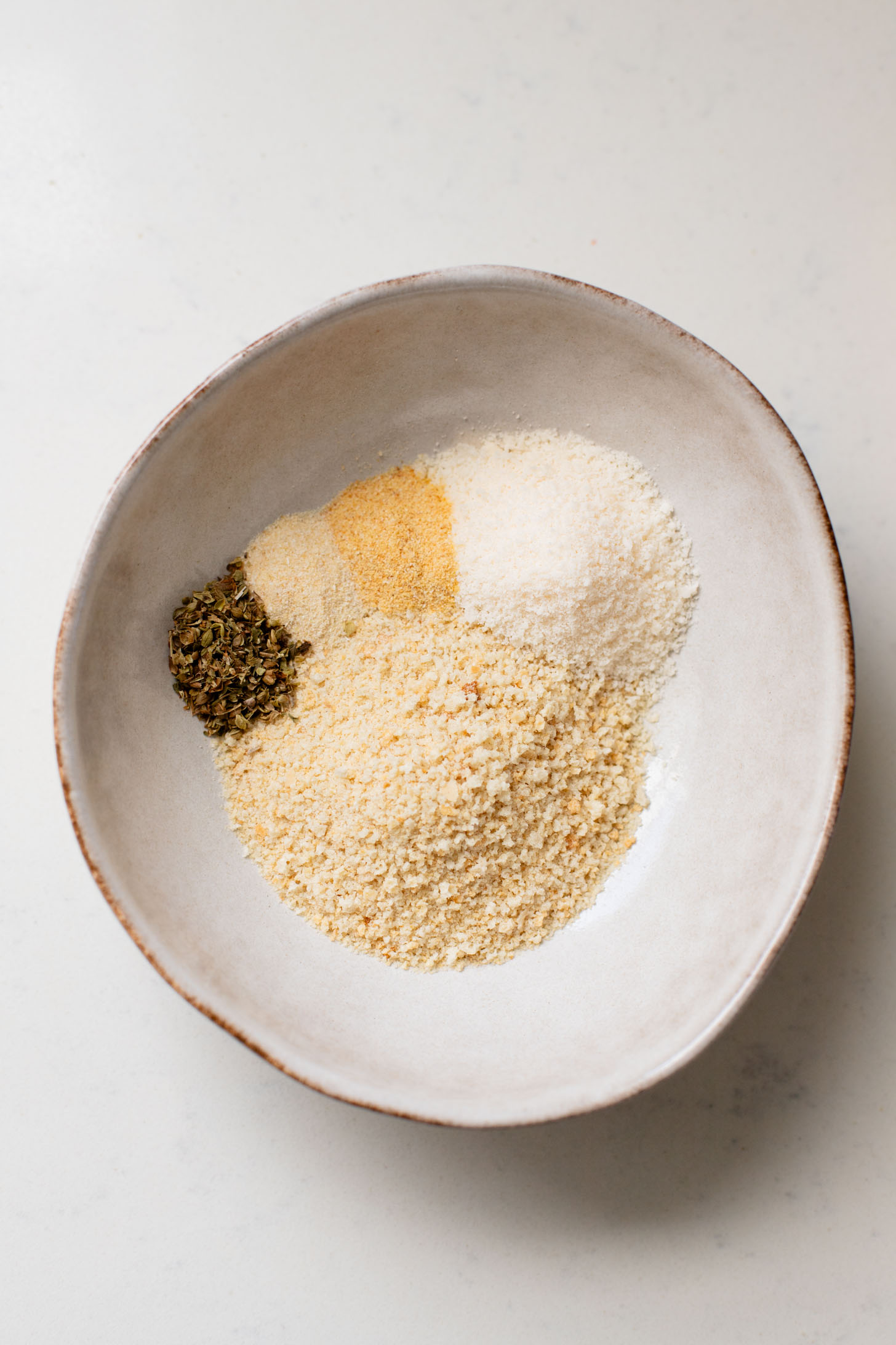 This Cheesy Butternut Squash Pasta Bake is the perfect vegan holiday casserole! Made with a dairy-free cheese sauce & tender squash pieces | ThisSavoryVegan.com