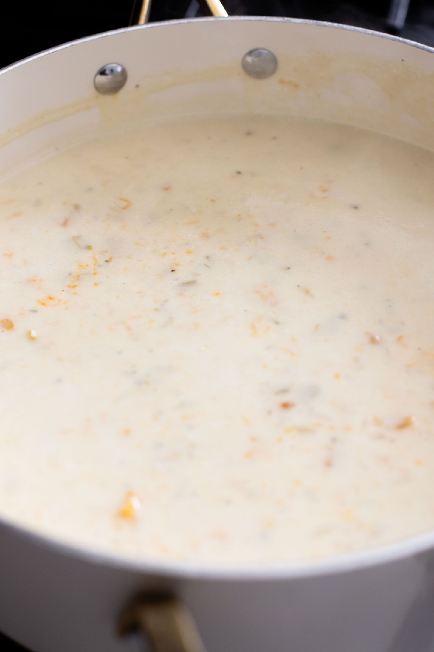 This Cheesy Butternut Squash Pasta Bake is the perfect vegan holiday casserole! Made with a dairy-free cheese sauce & tender squash pieces | ThisSavoryVegan.com