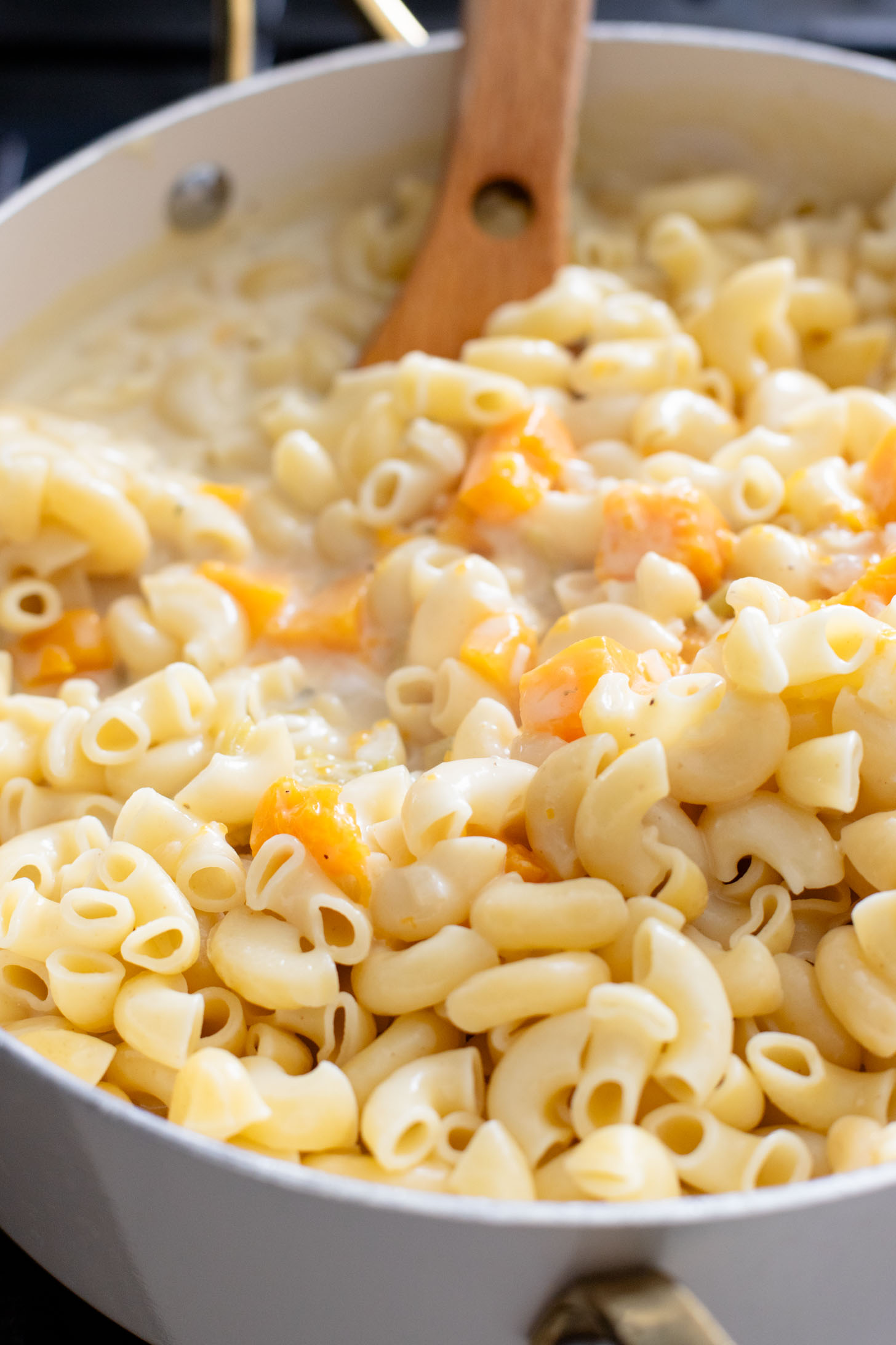 This Cheesy Butternut Squash Pasta Bake is the perfect vegan holiday casserole! Made with a dairy-free cheese sauce & tender squash pieces | ThisSavoryVegan.com