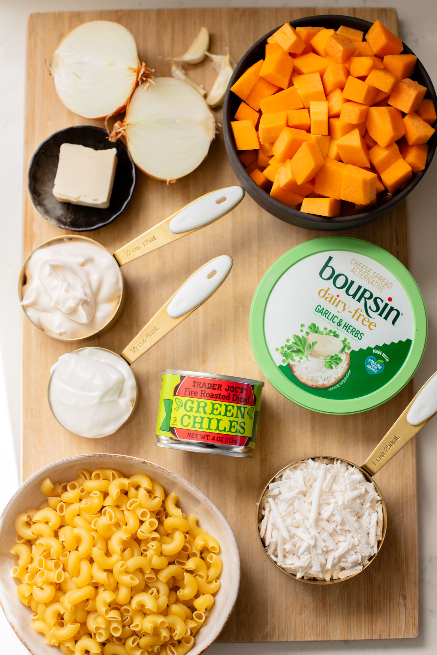 This Cheesy Butternut Squash Pasta Bake is the perfect vegan holiday casserole! Made with a dairy-free cheese sauce & tender squash pieces | ThisSavoryVegan.com