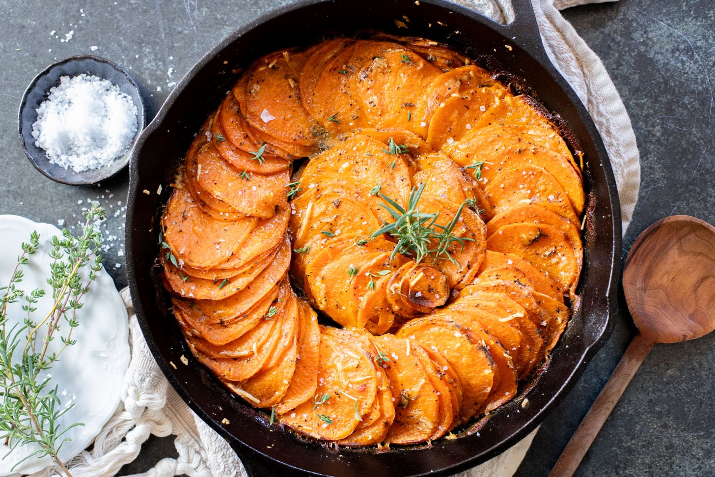 This Easy Sweet Potato Bake is the perfect dairy-free holiday side dish! A crispy crust and tender center, this potato bake is delicious | ThisSavoryVegan.com