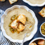 This Salsa Verde Cauliflower Soup is creamy & delicious. The salsa verde adds an unexpected and tasty flavor that takes this dairy-free soup to the next level | ThisSavoryVegan.com