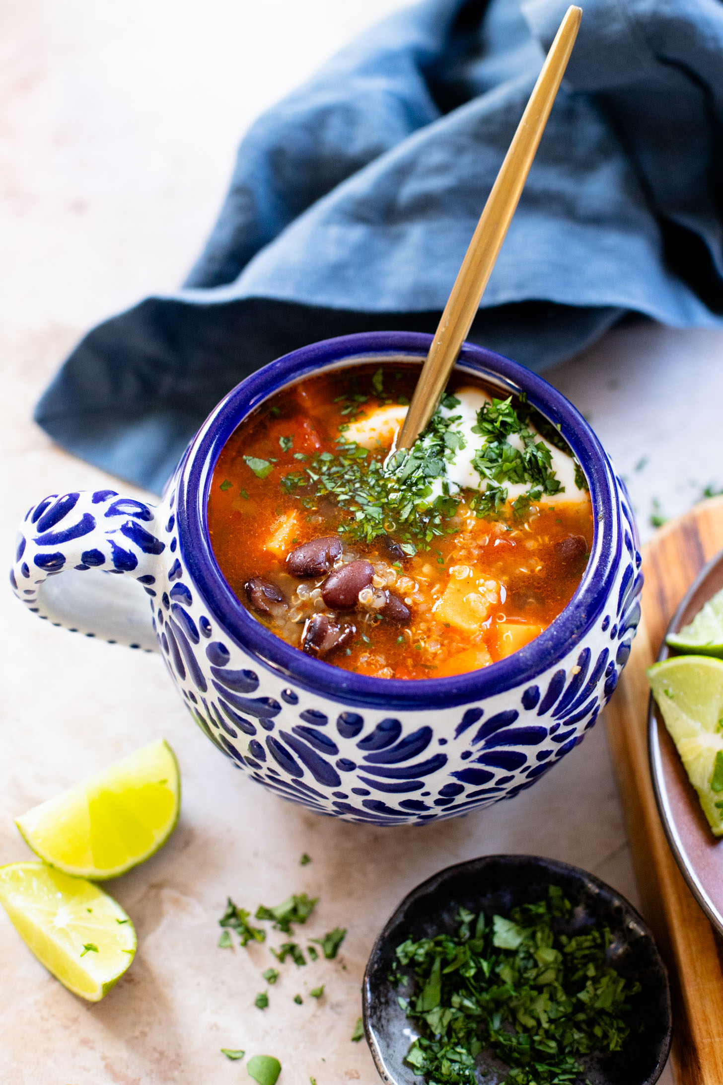 Healthy & delicious, this Sweet Potato Black Bean Soup is loaded with veggies, black beans and quinoa. Made in one pot in under an hour | ThisSavoryVegan.com