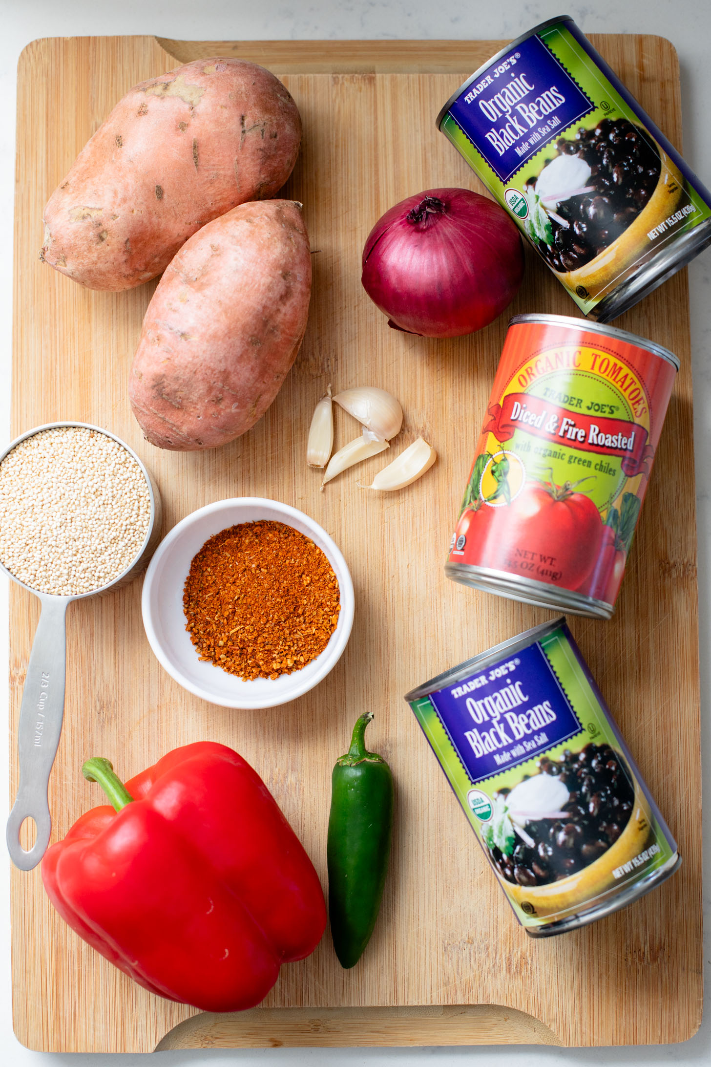 Healthy & delicious, this Sweet Potato Black Bean Soup is loaded with veggies, black beans and quinoa. Made in one pot in under an hour | ThisSavoryVegan.com