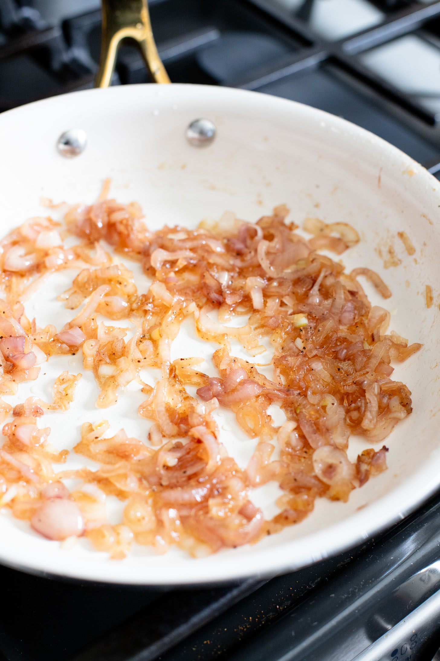If you want to impress a crowd, bring this Vegan Caramelized Shallot Cheese Dip to your next party! It is the perfect vegan appetizer | ThisSavoryVegan.com