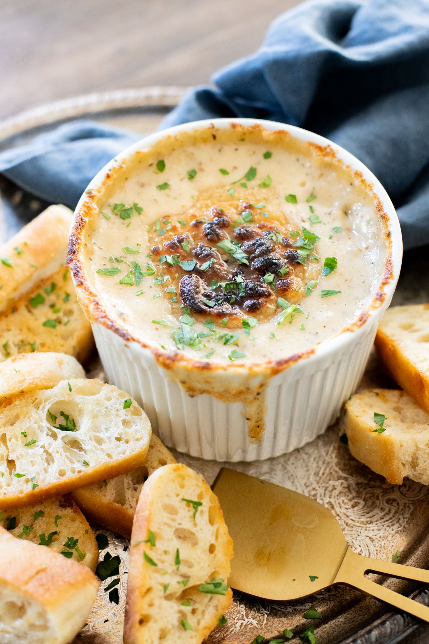 If you want to impress a crowd, bring this Vegan Caramelized Shallot Cheese Dip to your next party! It is the perfect vegan appetizer | ThisSavoryVegan.com