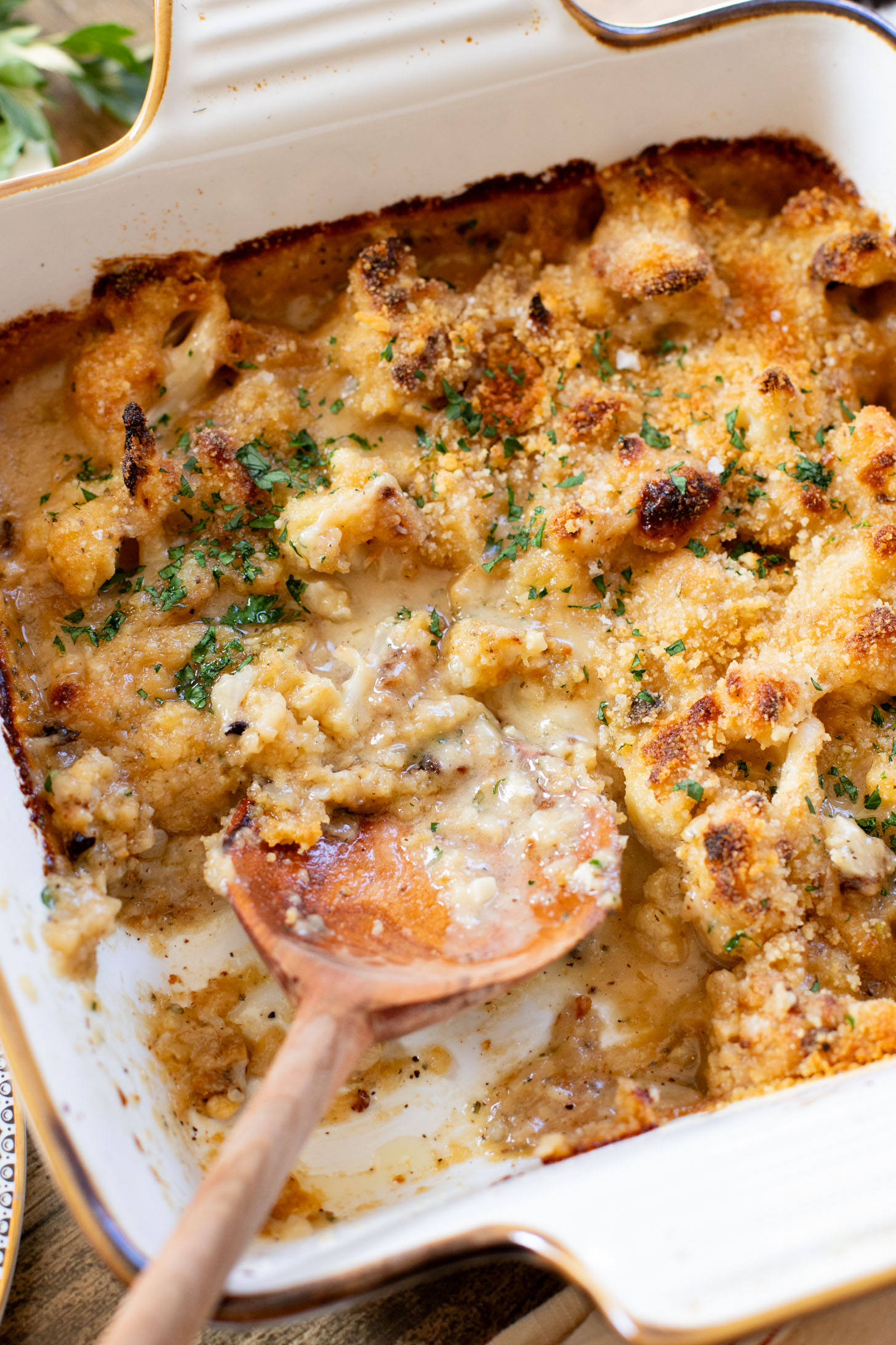 This Vegan Cheesy Cauliflower Bake is the perfect holiday side dish - and a sneaky way to get kids to eat veggies! Creamy, dairy-free & delish | ThisSavoryVegan.com