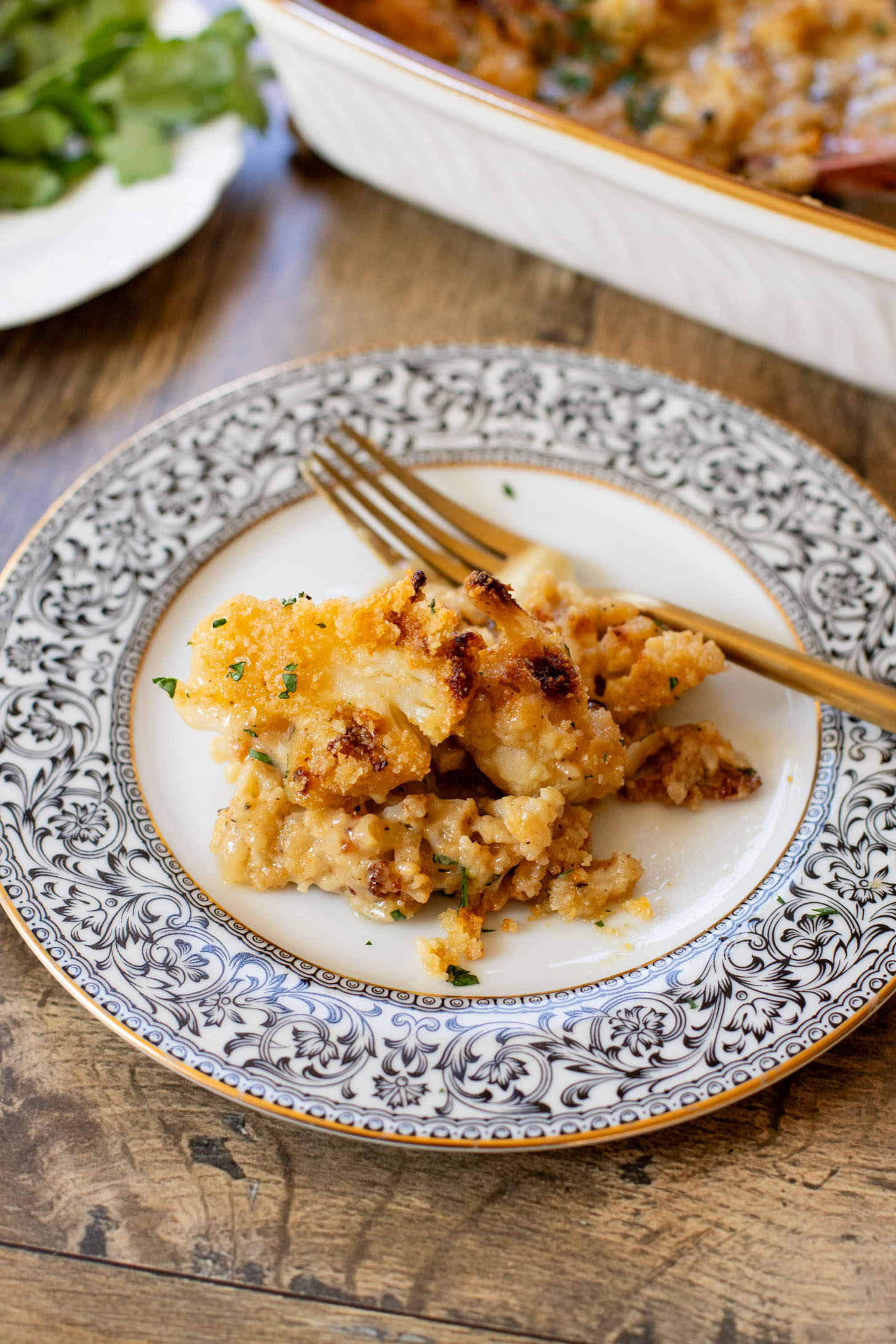 This Vegan Cheesy Cauliflower Bake is the perfect holiday side dish - and a sneaky way to get kids to eat veggies! Creamy, dairy-free & delish | ThisSavoryVegan.com