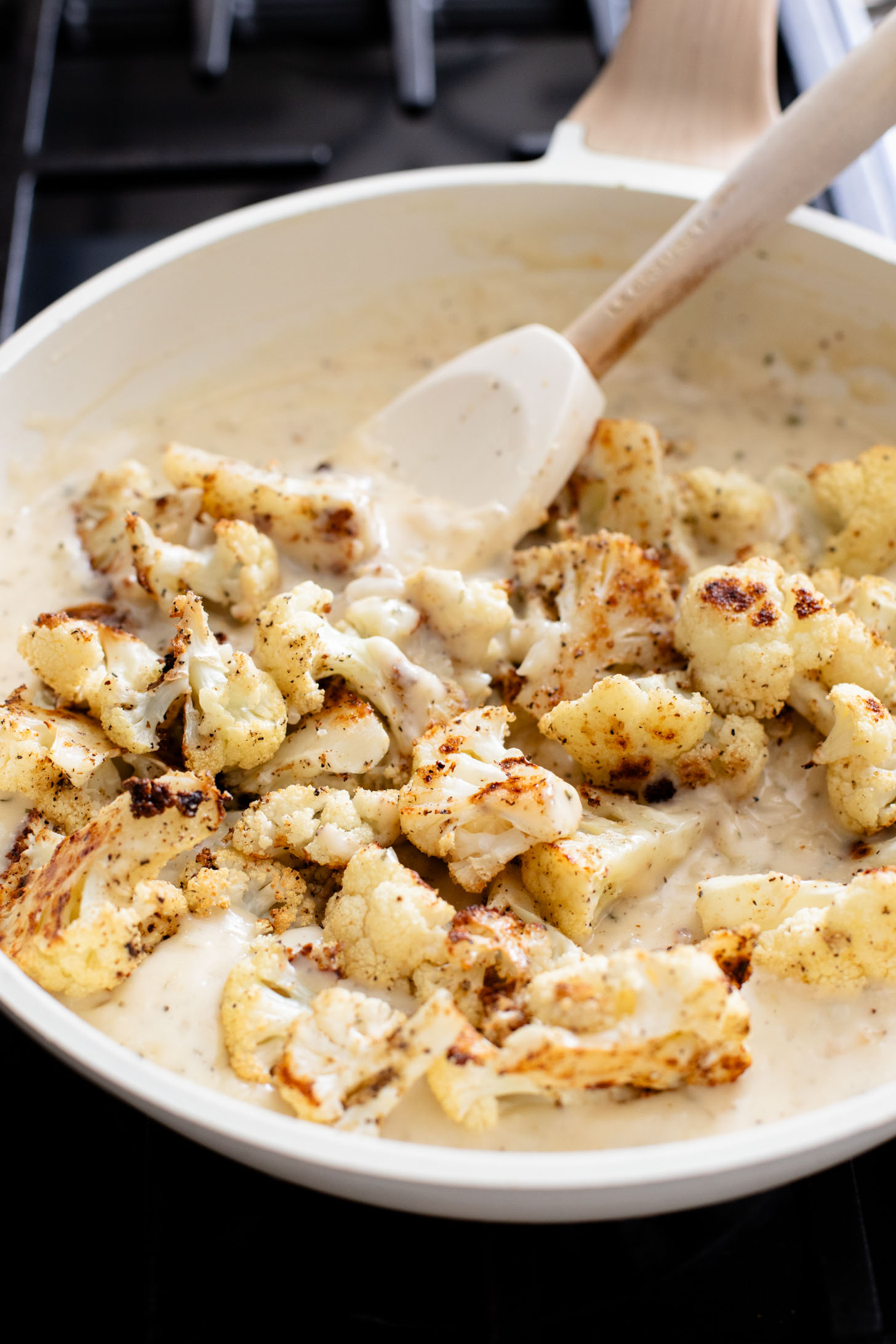 This Vegan Cheesy Cauliflower Bake is the perfect holiday side dish - and a sneaky way to get kids to eat veggies! Creamy, dairy-free & delish | ThisSavoryVegan.com