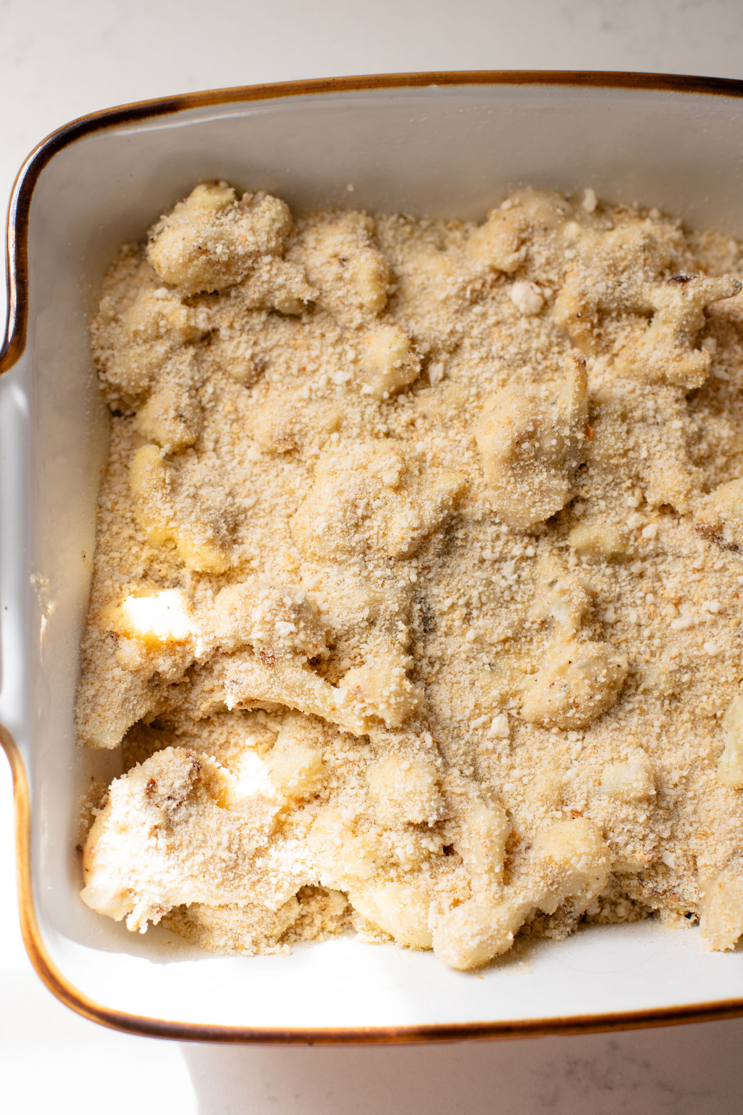 This Vegan Cheesy Cauliflower Bake is the perfect holiday side dish - and a sneaky way to get kids to eat veggies! Creamy, dairy-free & delish | ThisSavoryVegan.com
