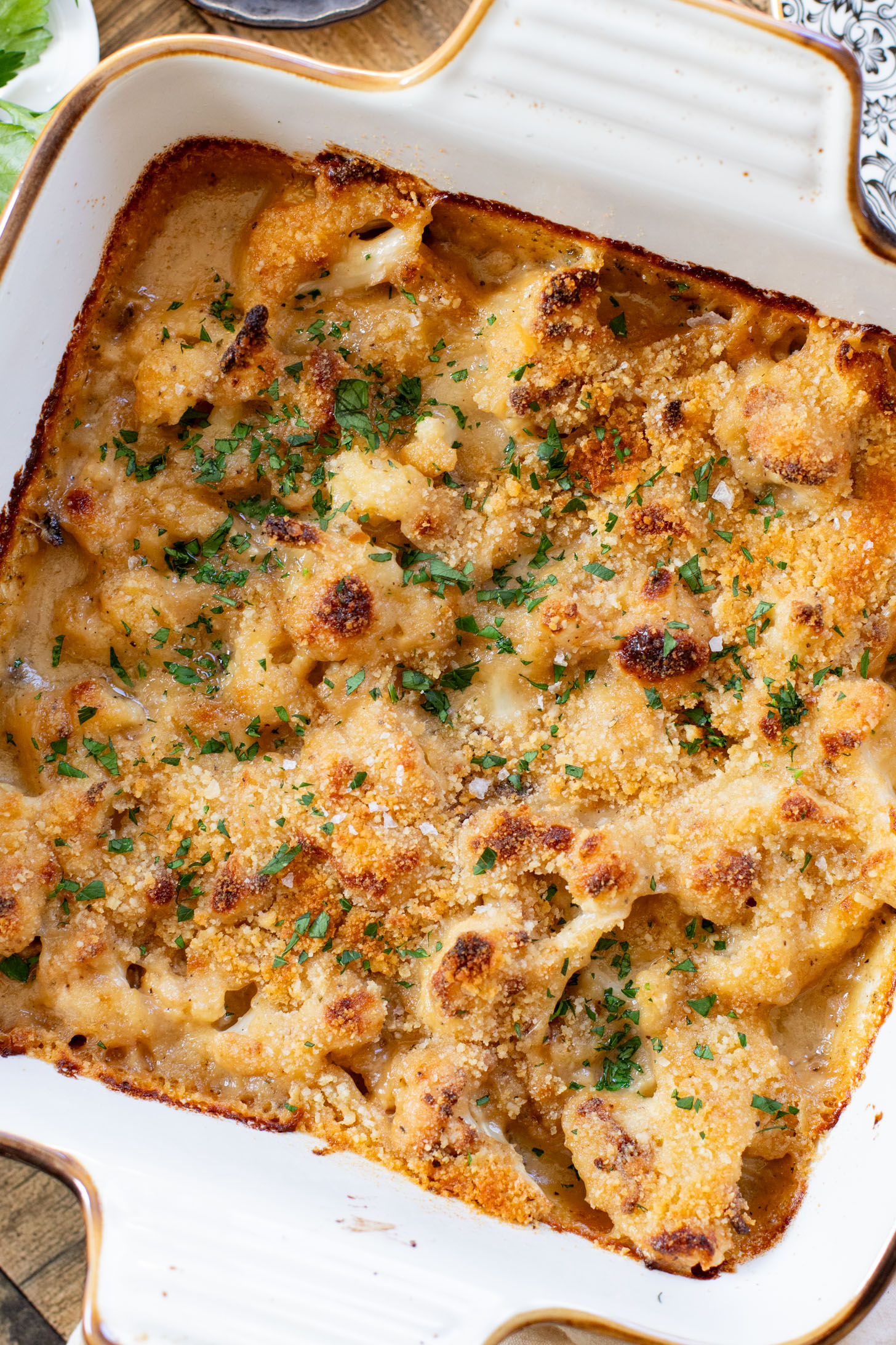 This Vegan Cheesy Cauliflower Bake is the perfect holiday side dish - and a sneaky way to get kids to eat veggies! Creamy, dairy-free & delish | ThisSavoryVegan.com