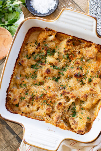 This Vegan Cheesy Cauliflower Bake is the perfect holiday side dish - and a sneaky way to get kids to eat veggies! Creamy, dairy-free & delish | ThisSavoryVegan.com