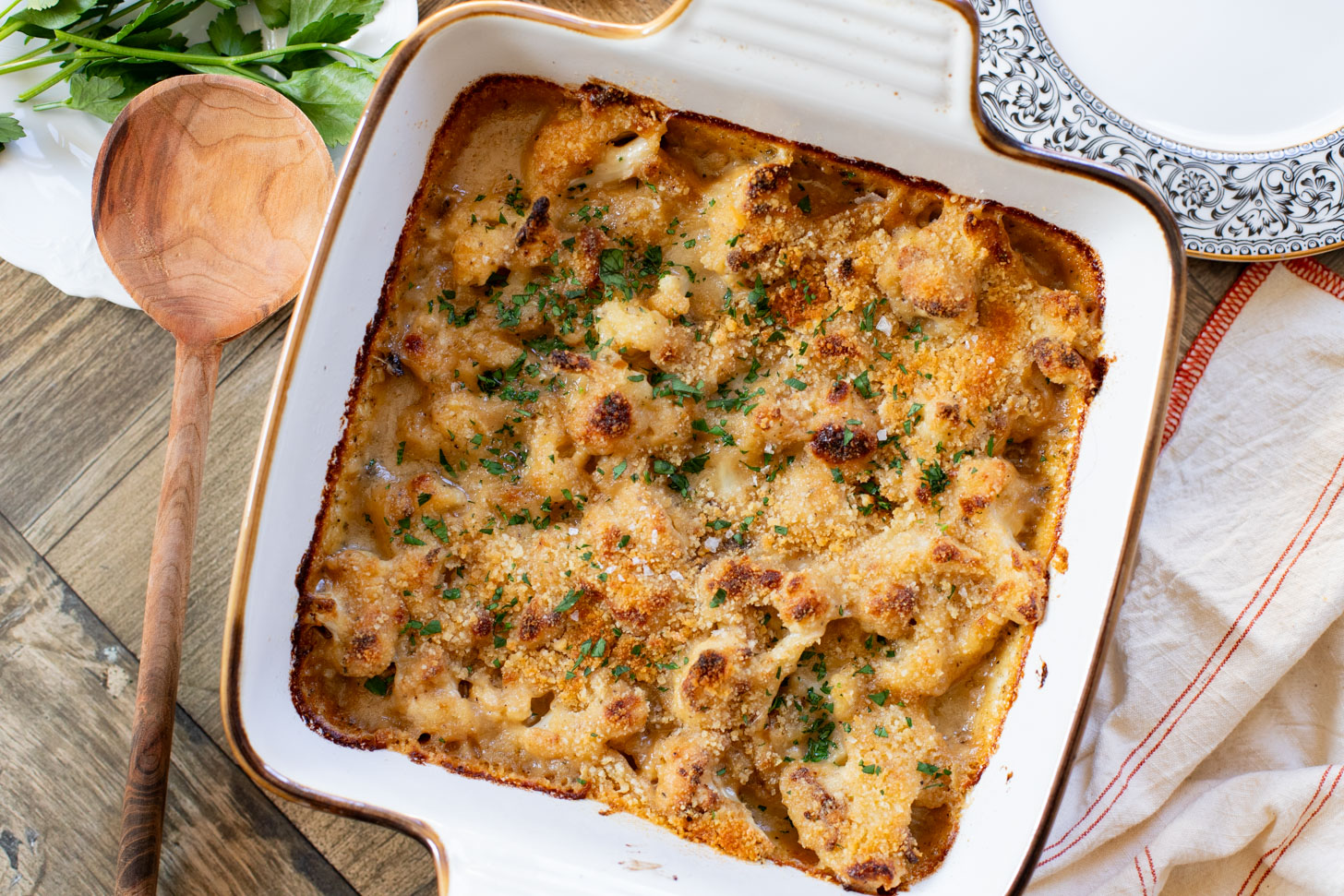This Vegan Cheesy Cauliflower Bake is the perfect holiday side dish - and a sneaky way to get kids to eat veggies! Creamy, dairy-free & delish | ThisSavoryVegan.com