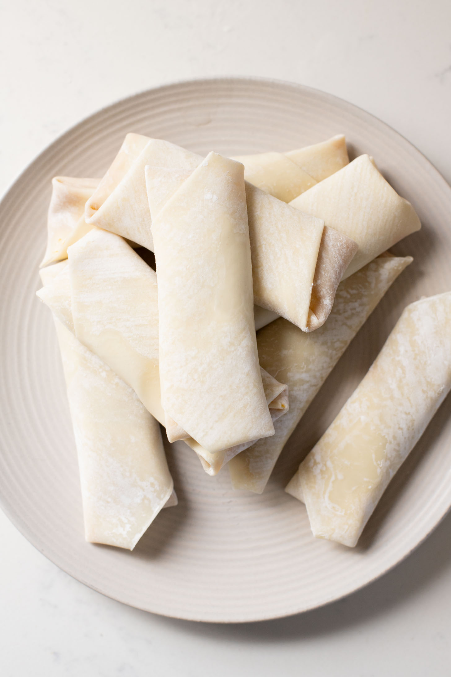 These Pumpkin Pie Egg Rolls are the perfect dessert to serve at your holiday feast! A dairy-free pumpkin pie filling & crispy vegan egg roll wrappers | ThisSavoryVegan.com