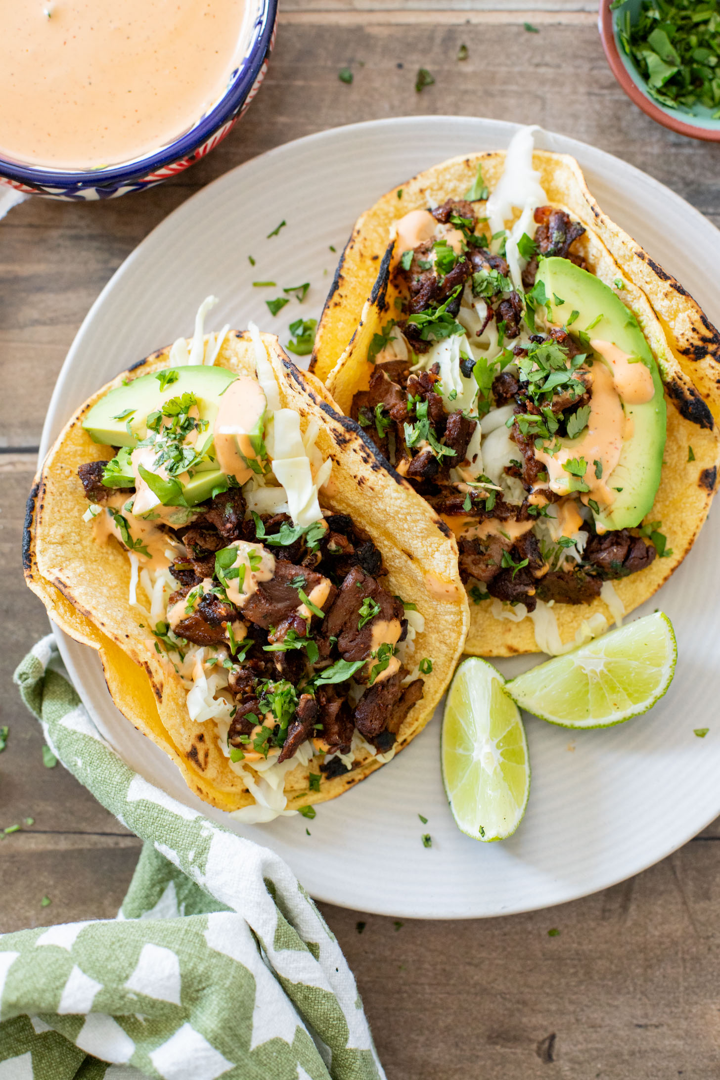 These Vegan Steak Tacos are SO good! Crispy vegan steak is cooked until super crispy and then loaded up in tortillas with a creamy chipotle sauce | ThisSavoryVegan.com