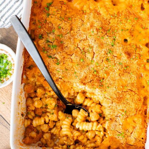 Comfort food in a casserole...and it is dairy-free! This Buffalo Chickpea Pasta Bake is a super fun, family-friendly weeknight dinner idea | ThisSavoryVegan.com