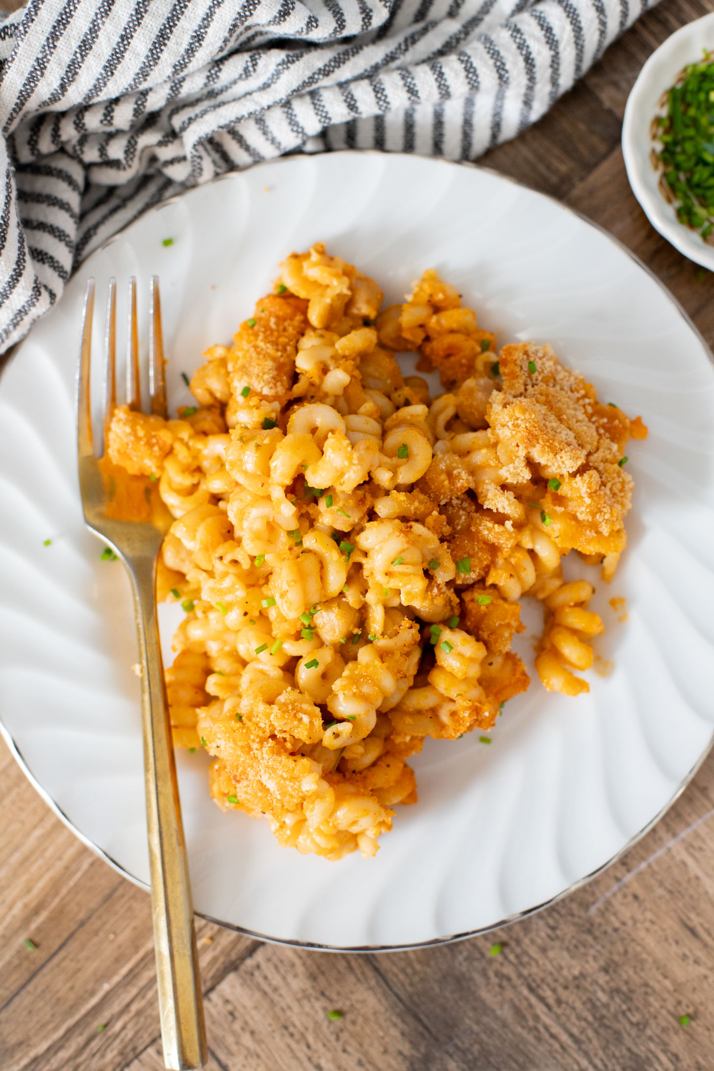 Comfort food in a casserole...and it is dairy-free! This Buffalo Chickpea Pasta Bake is a super fun, family-friendly weeknight dinner idea | ThisSavoryVegan.com
