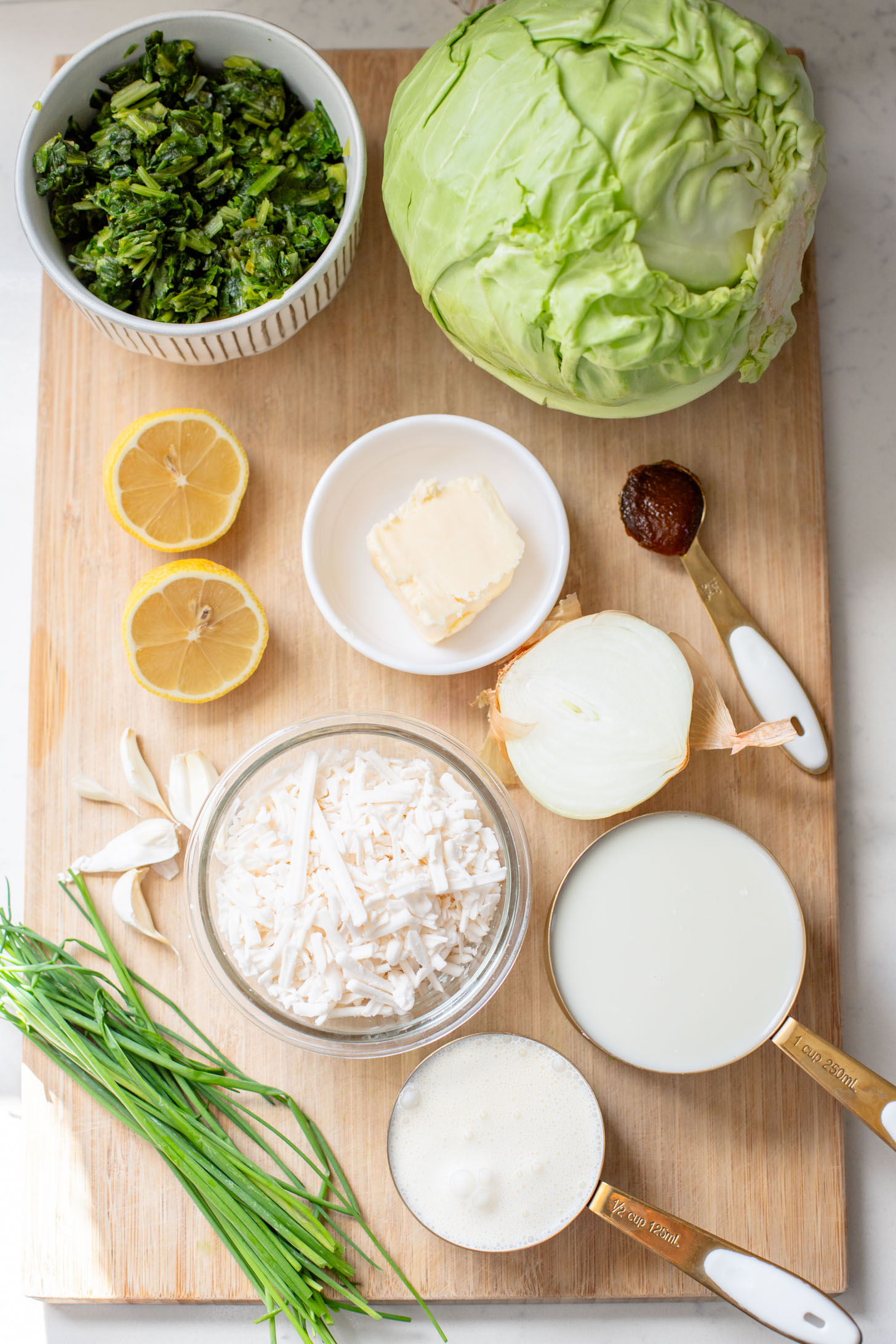 This dairy-free Charred Cabbage in Creamy Spinach Sauce is the ultimate veggie side dish! When comfort food & veggies meet | ThisSavoryVegan.com