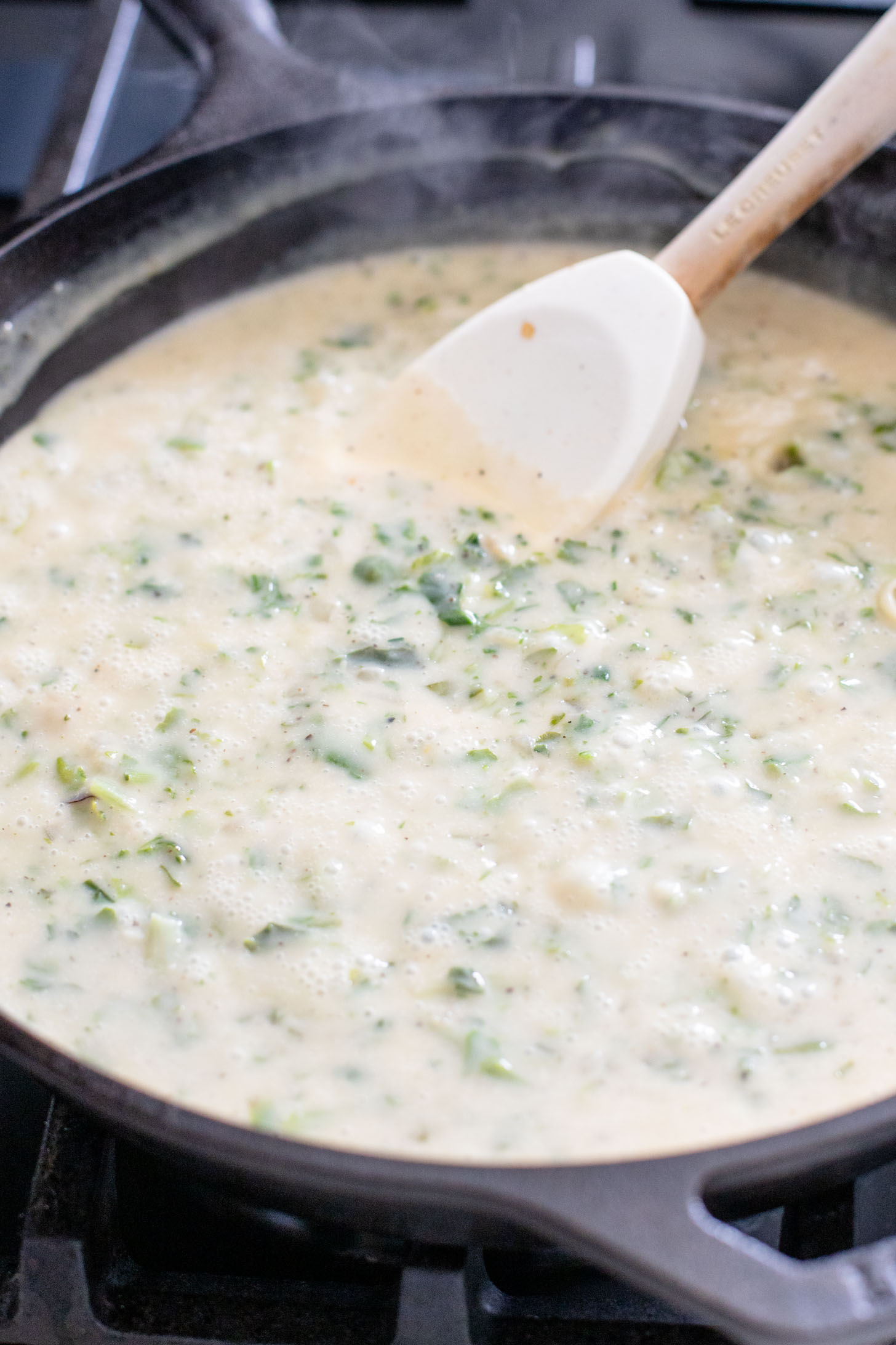 This dairy-free Charred Cabbage in Creamy Spinach Sauce is the ultimate veggie side dish! When comfort food & veggies meet | ThisSavoryVegan.com