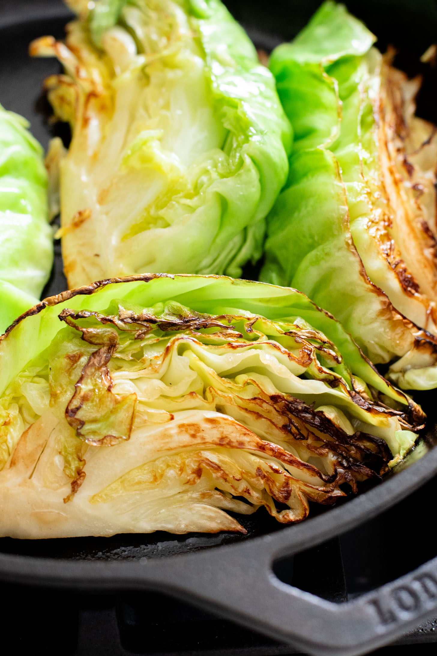 This dairy-free Charred Cabbage in Creamy Spinach Sauce is the ultimate veggie side dish! When comfort food & veggies meet | ThisSavoryVegan.com