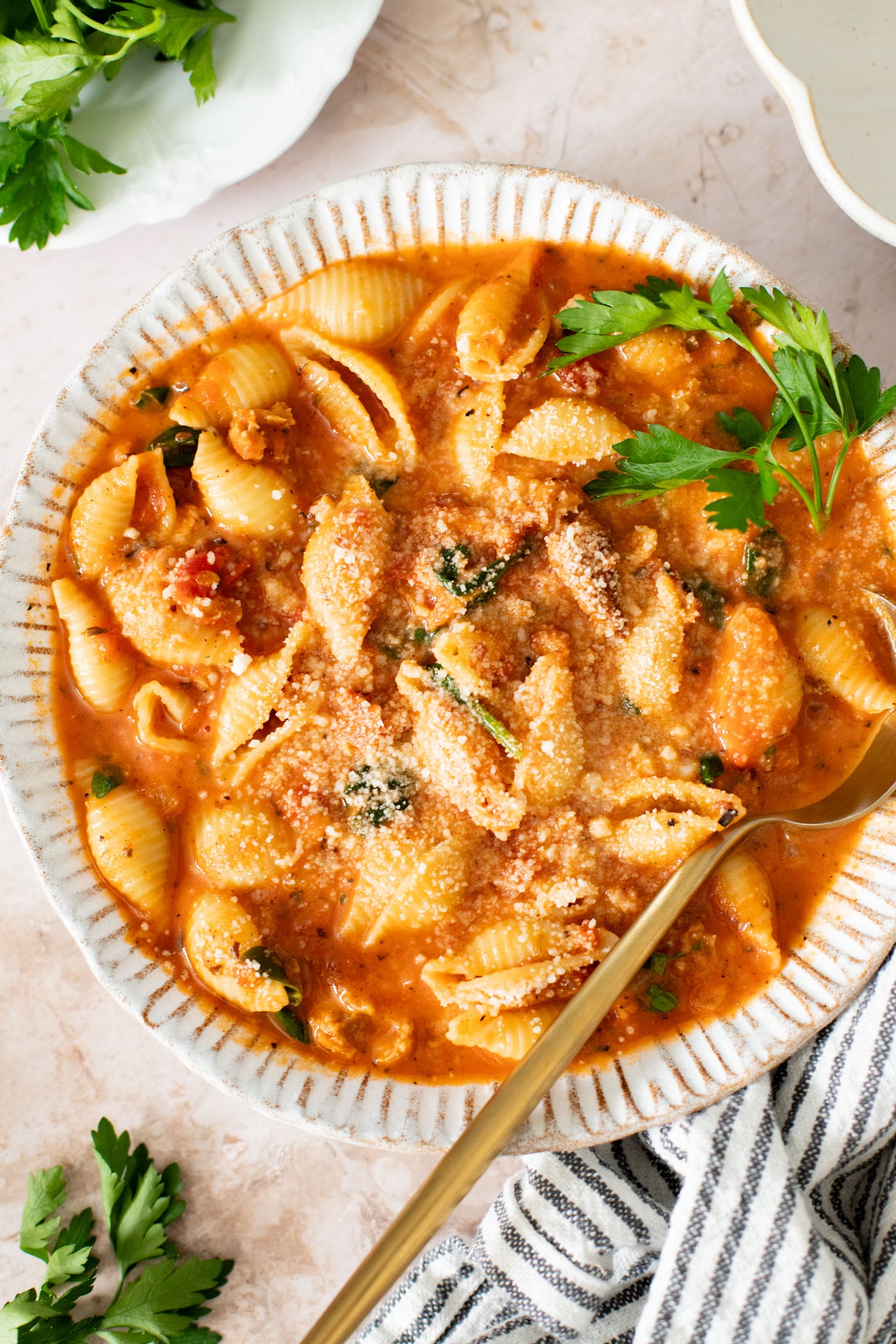This Creamy Sausage & Pasta Soup is made with vegan sausage and dairy-free cream! A cozy vegan soup filled with veggies & pasta | ThisSavoryVegan.com