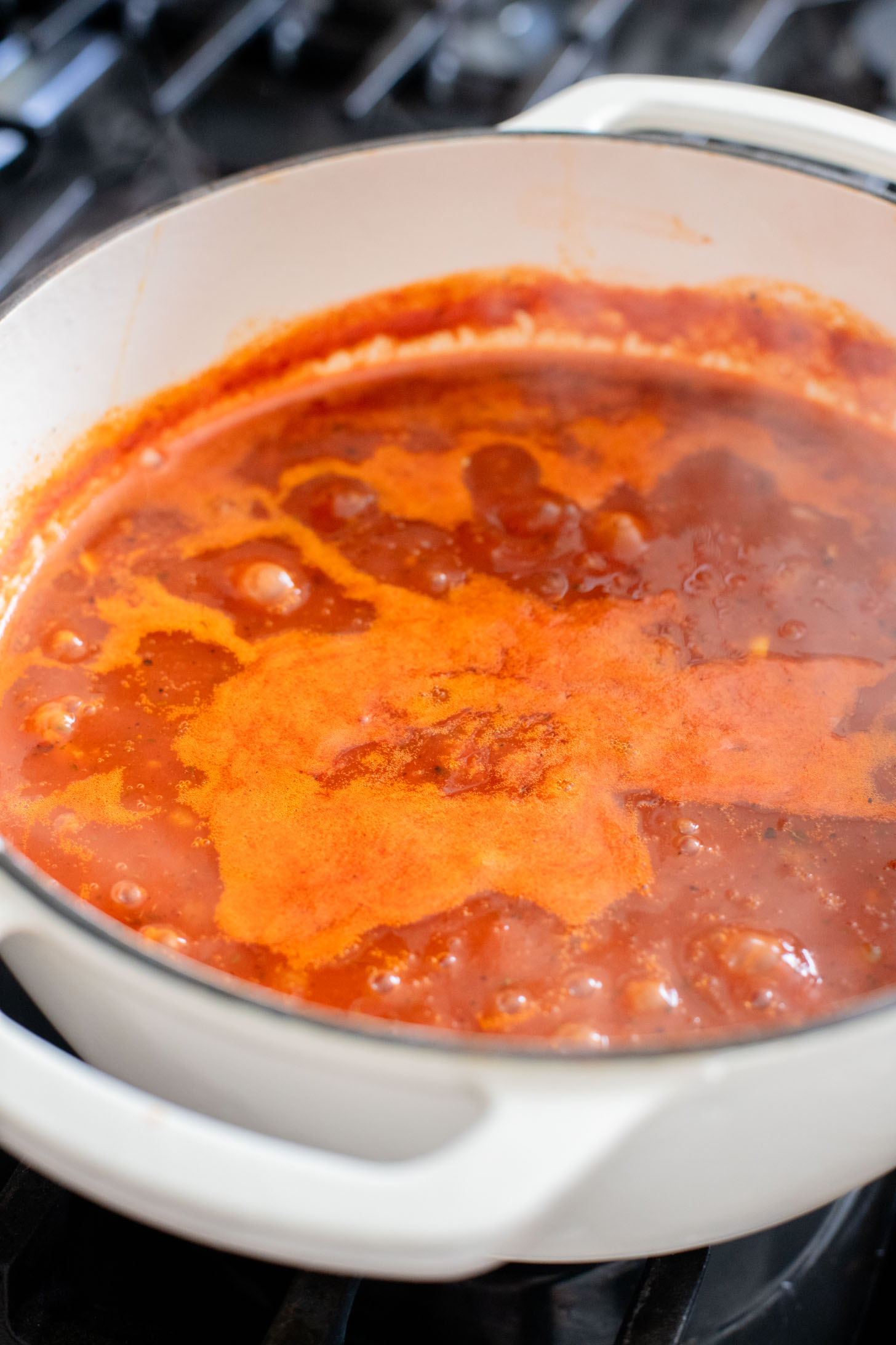 This Creamy Sausage & Pasta Soup is made with vegan sausage and dairy-free cream! A cozy vegan soup filled with veggies & pasta | ThisSavoryVegan.com