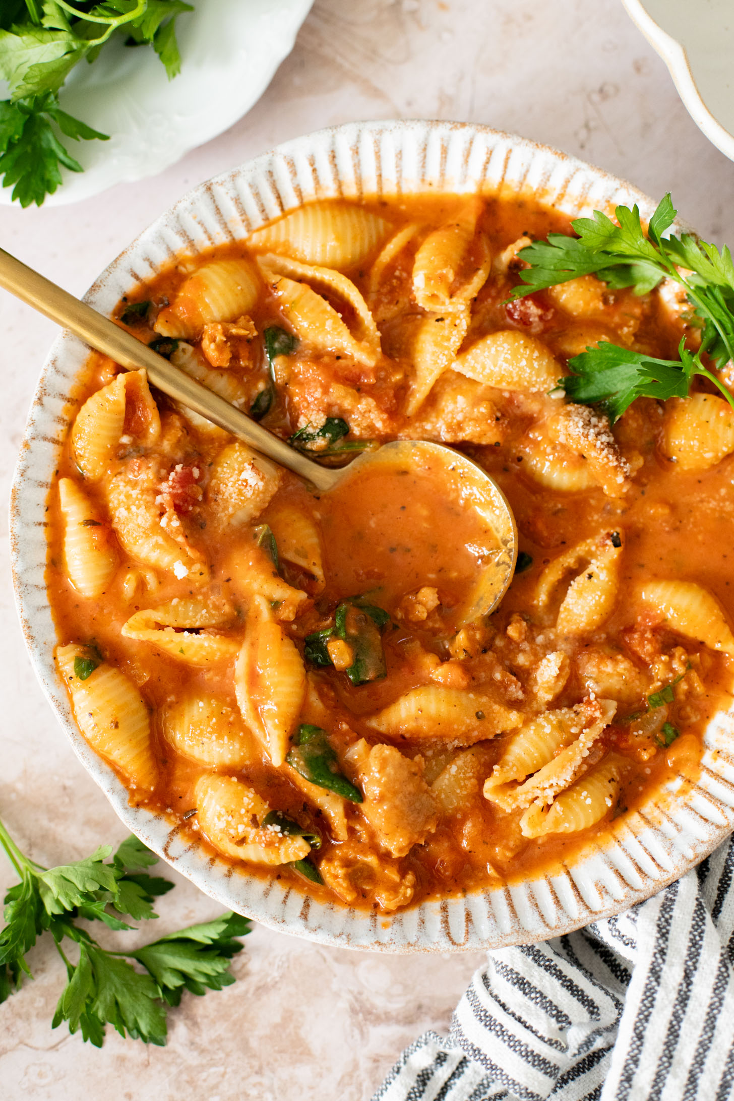 This Creamy Sausage & Pasta Soup is made with vegan sausage and dairy-free cream! A cozy vegan soup filled with veggies & pasta | ThisSavoryVegan.com