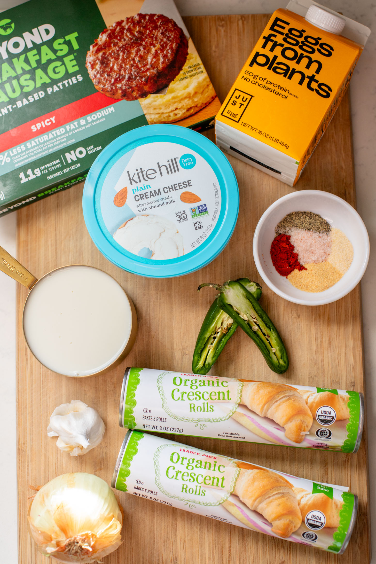 This Crescent Roll Breakfast Casserole is made with vegan eggs & vegan sausage. Perfect vegan breakfast casserole to serve a crowd | ThisSavoryVegan.com