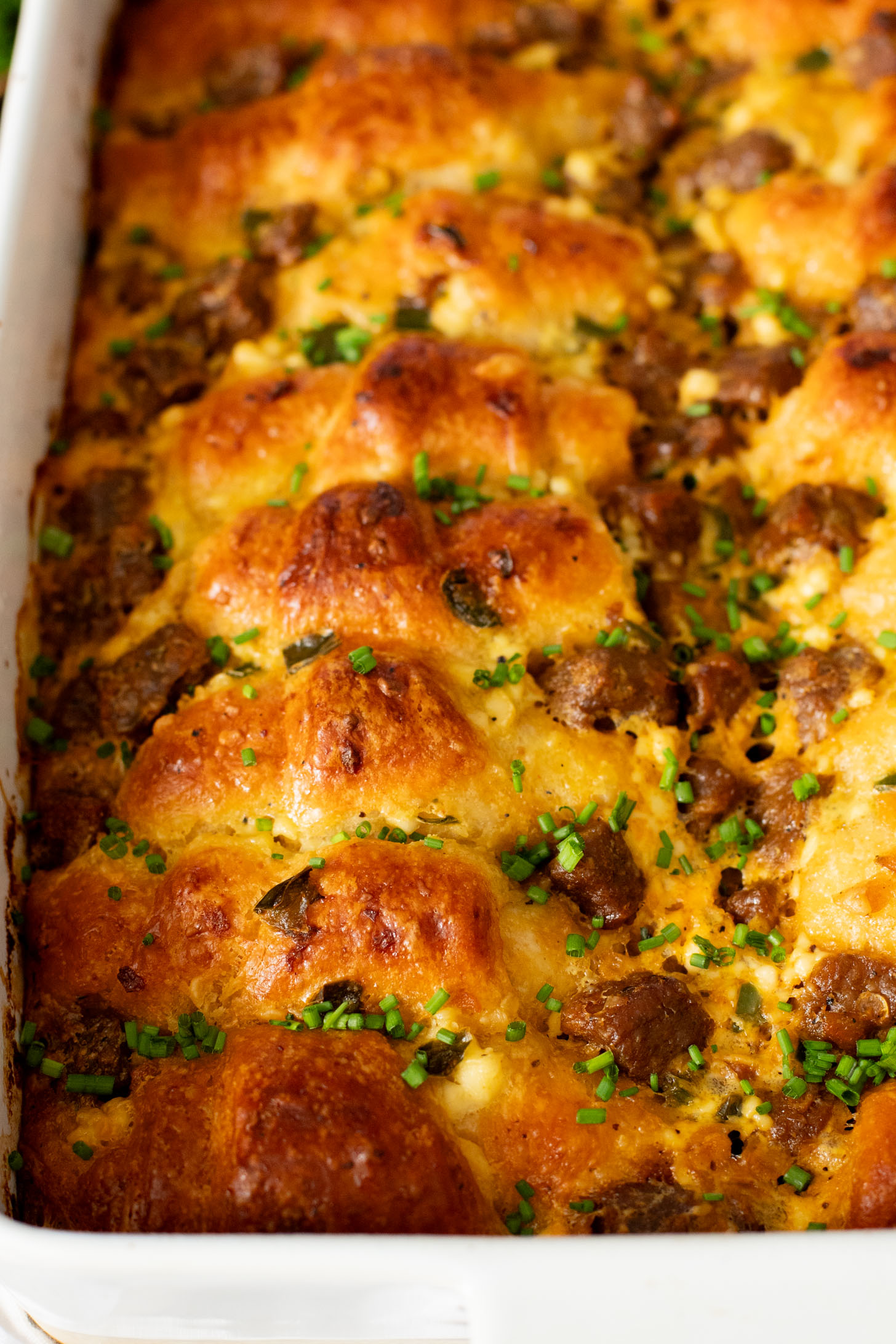 This Crescent Roll Breakfast Casserole is made with vegan eggs & vegan sausage. Perfect vegan breakfast casserole to serve a crowd | ThisSavoryVegan.com