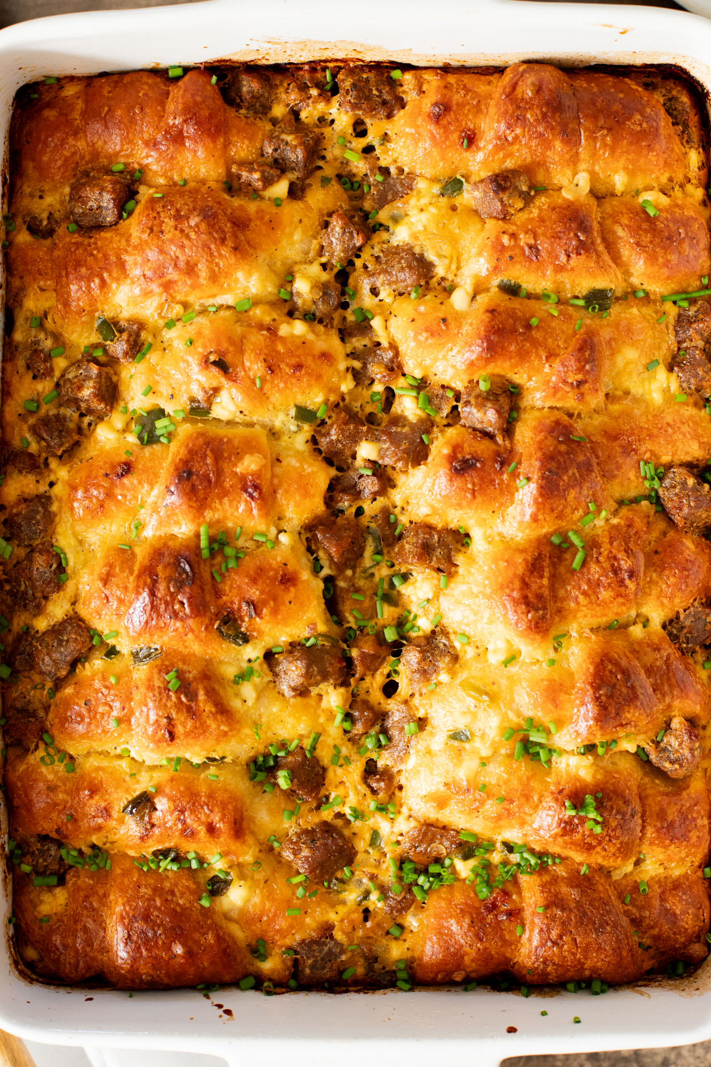 This Crescent Roll Breakfast Casserole is made with vegan eggs & vegan sausage. Perfect vegan breakfast casserole to serve a crowd | ThisSavoryVegan.com