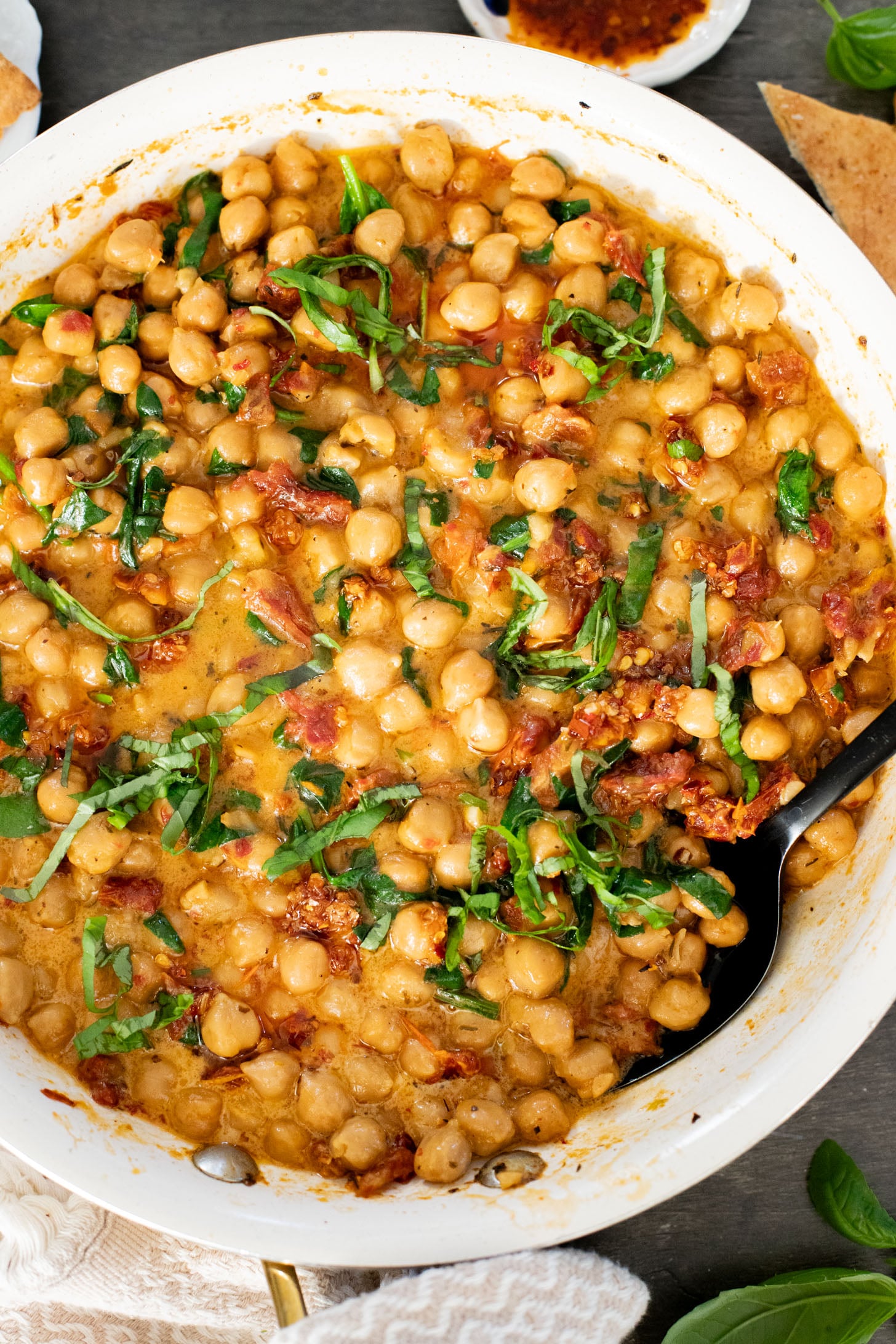 These Marry Me Chickpeas are creamy, delicious...and made in one pot! The perfect Tuscan flavor and best served with toasted bread | ThisSavoryVegan.com