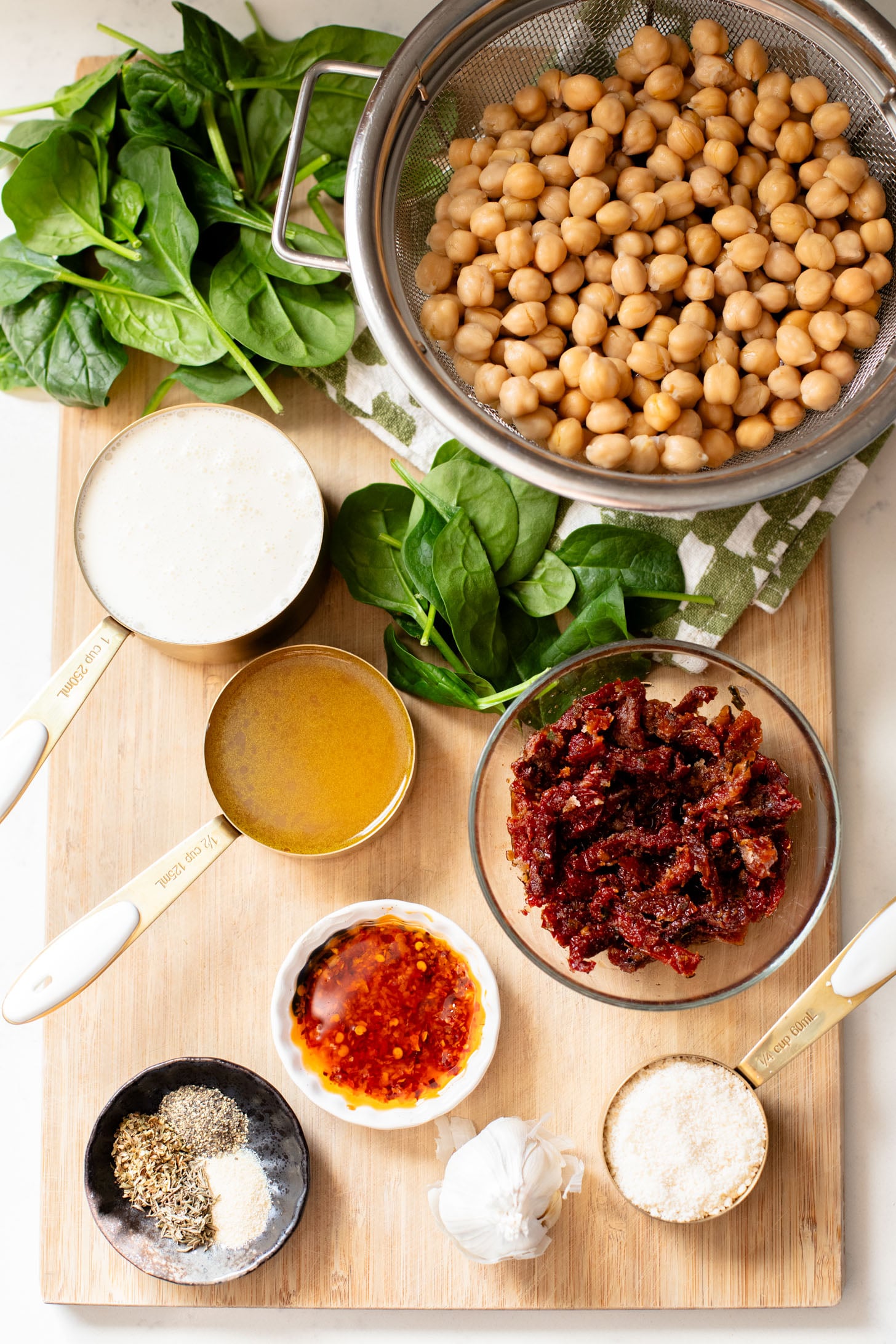 These Marry Me Chickpeas are creamy, delicious...and made in one pot! The perfect Tuscan flavor and best served with toasted bread | ThisSavoryVegan.com