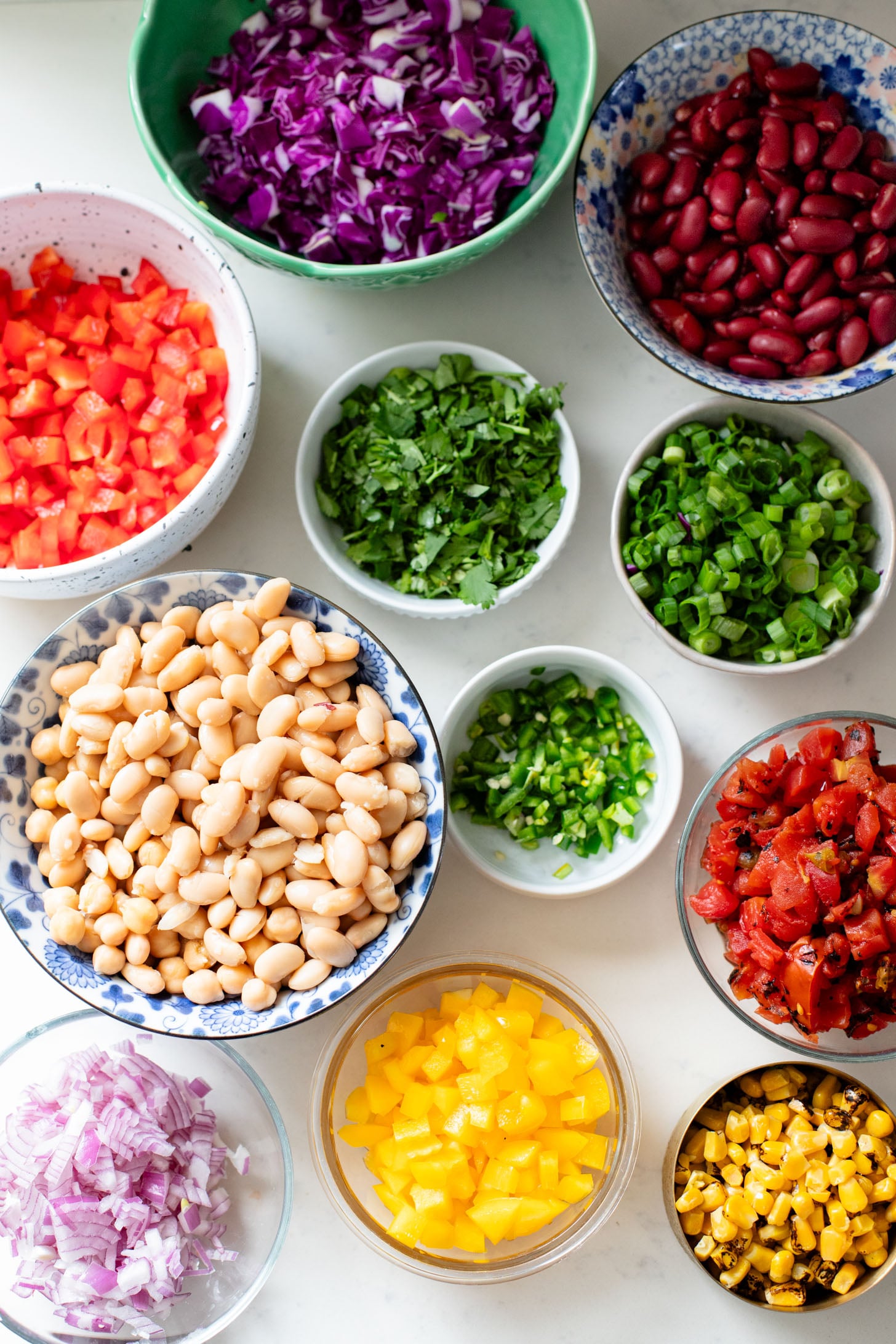 A great way to get plant protein & veggies in, this Southwest Dense Bean Salad is not only healthy it is super tasty. Perfect for meal prep | ThisSavoryVegan.com